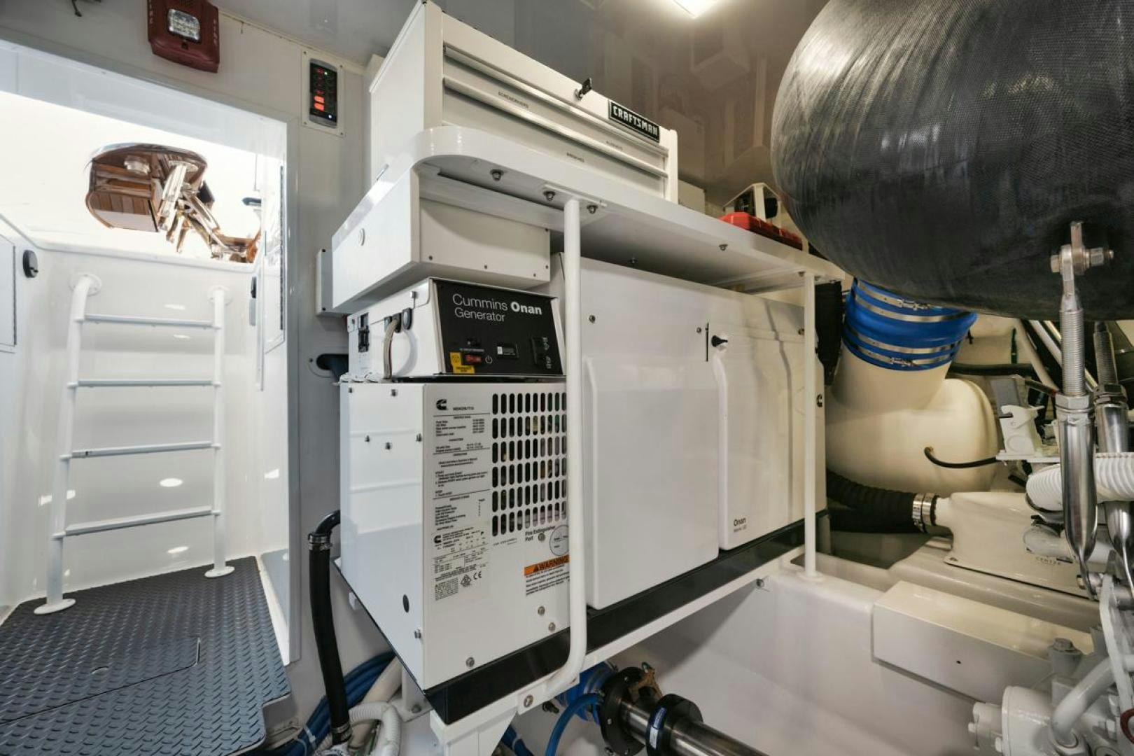 a machine in a room aboard MADNIC Yacht for Sale