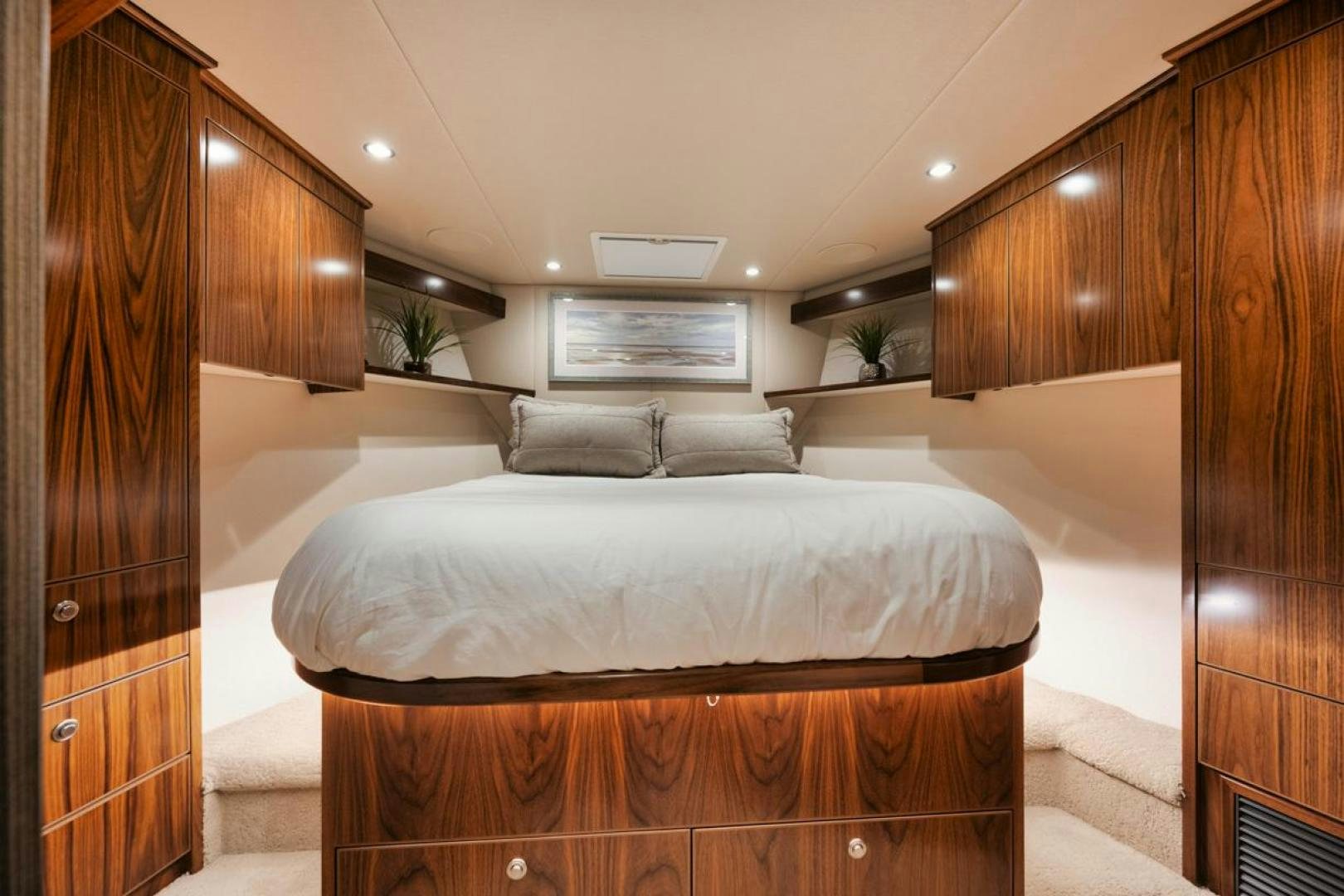 a bed in a room aboard MADNIC Yacht for Sale