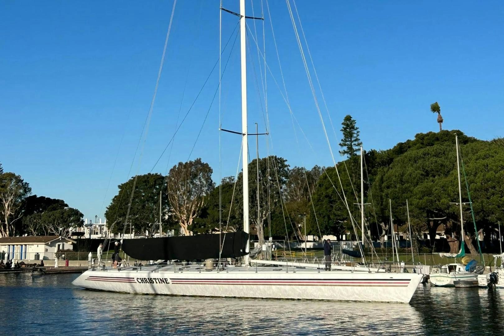 a sailboat docked at a pier aboard CHRISTINE Yacht for Sale