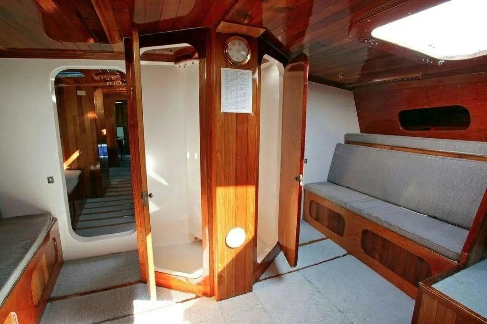 a train car with a bench aboard CHRISTINE Yacht for Sale