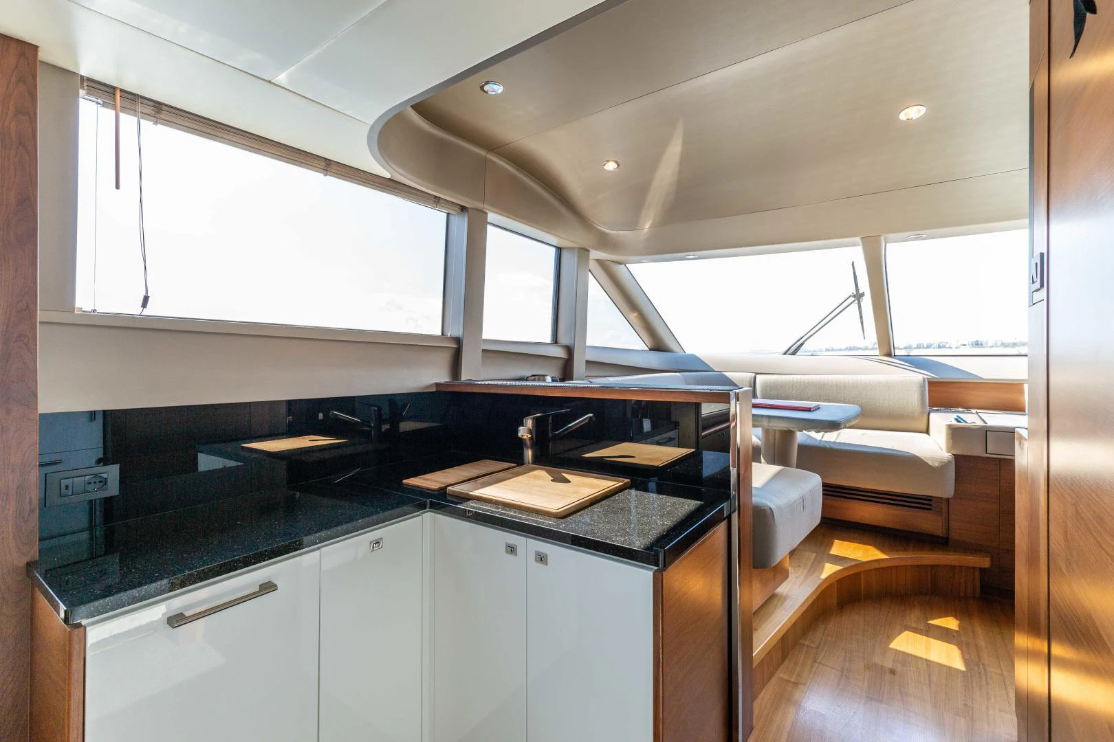 a kitchen with a large window aboard CAPE COD Yacht for Sale