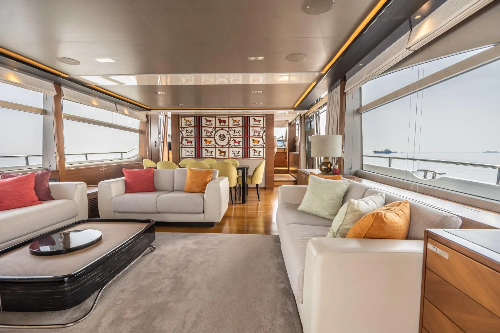 a living room with a couch and a table aboard CAPE COD Yacht for Sale