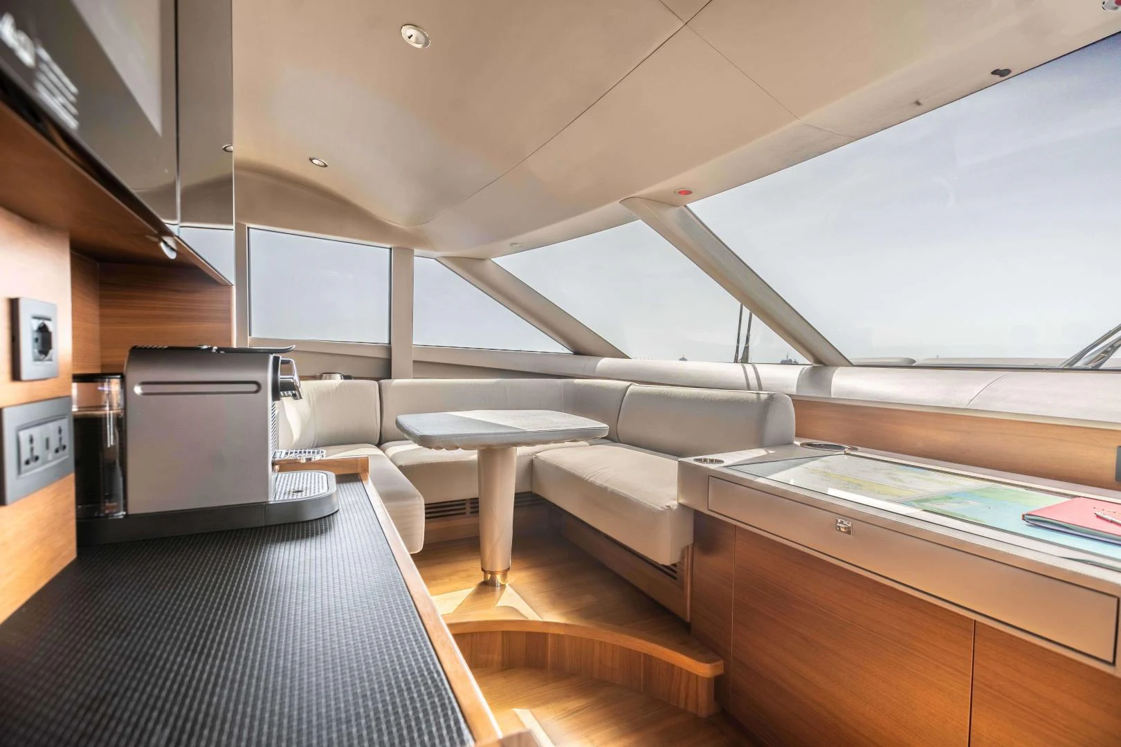 a room with a couch and a table aboard CAPE COD Yacht for Sale