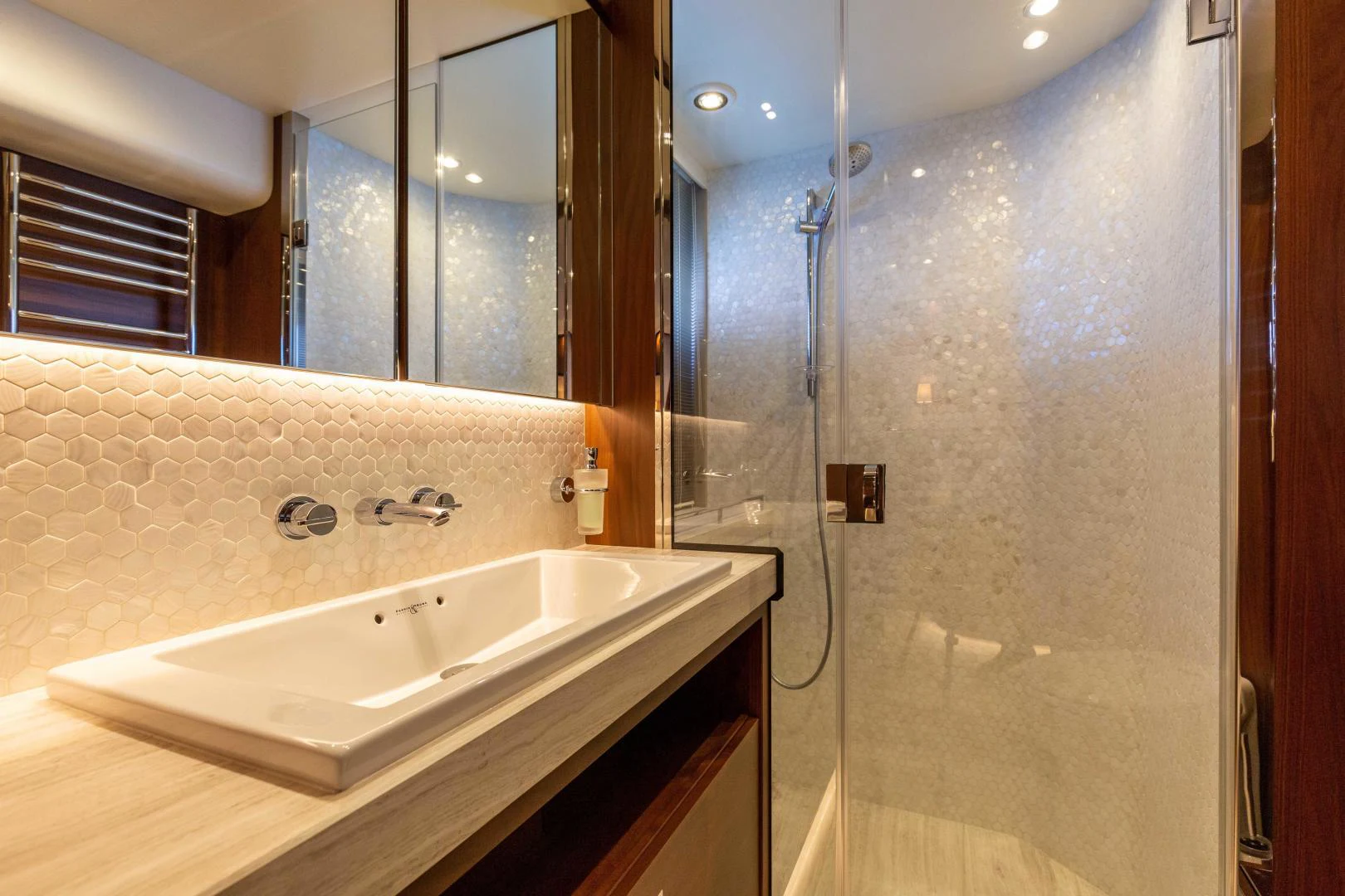 a bathroom with a sink and a shower aboard CAPE COD Yacht for Sale