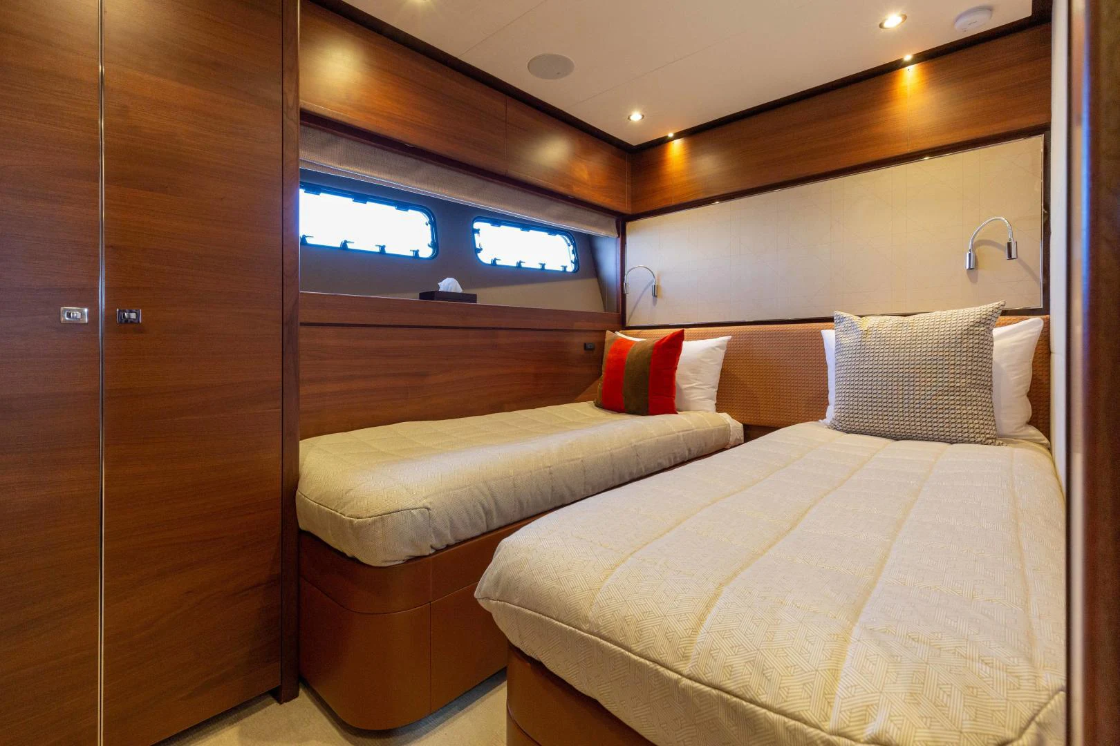 a room with a bed and a tv on the wall aboard CAPE COD Yacht for Sale