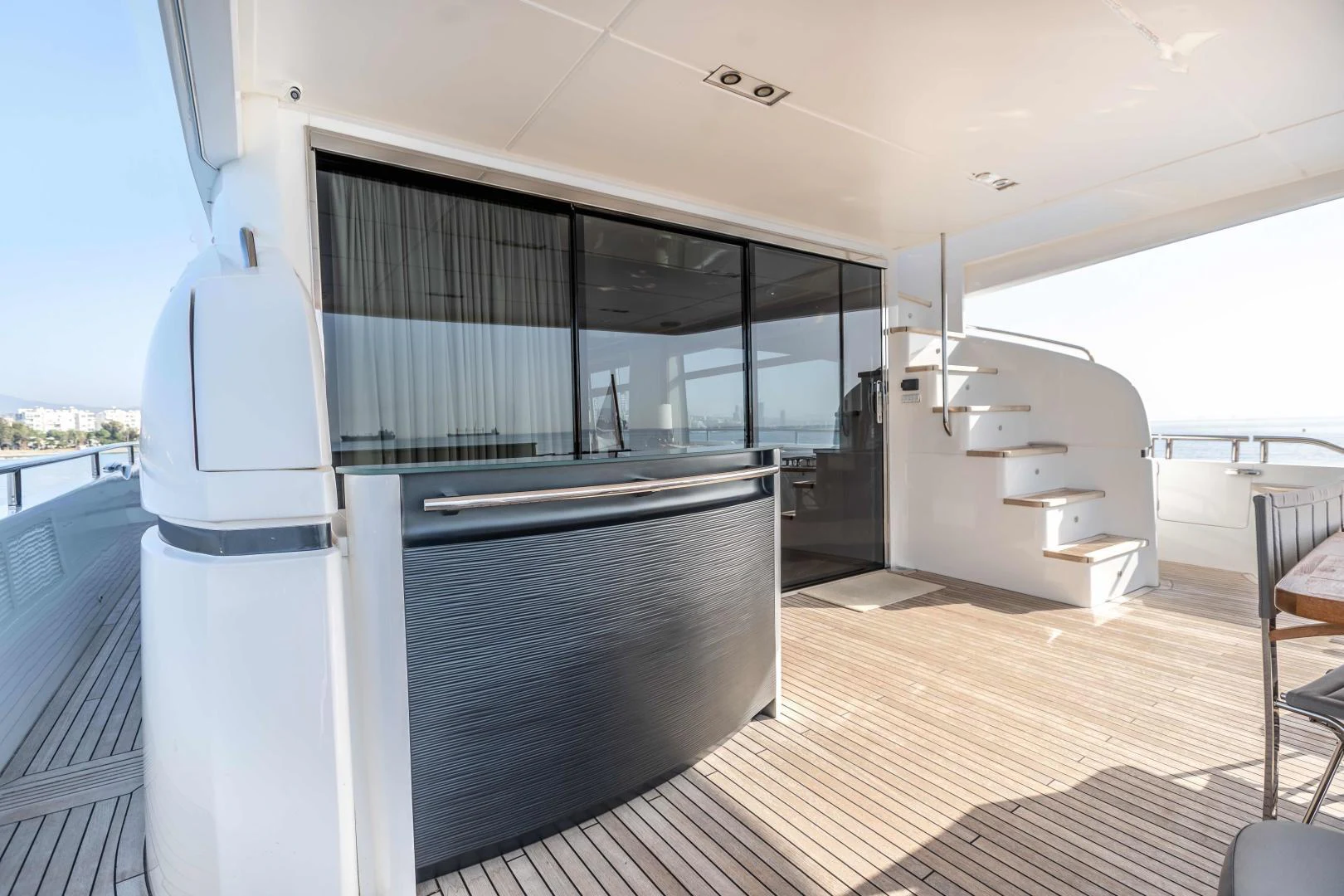 a room with a large glass door aboard CAPE COD Yacht for Sale