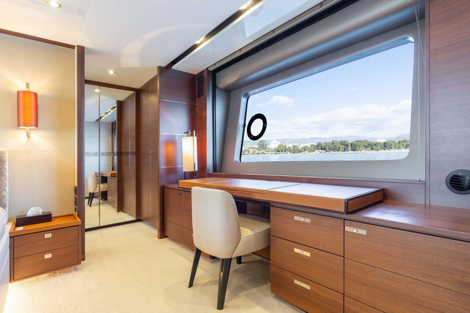 a room with a desk and a large window aboard CAPE COD Yacht for Sale
