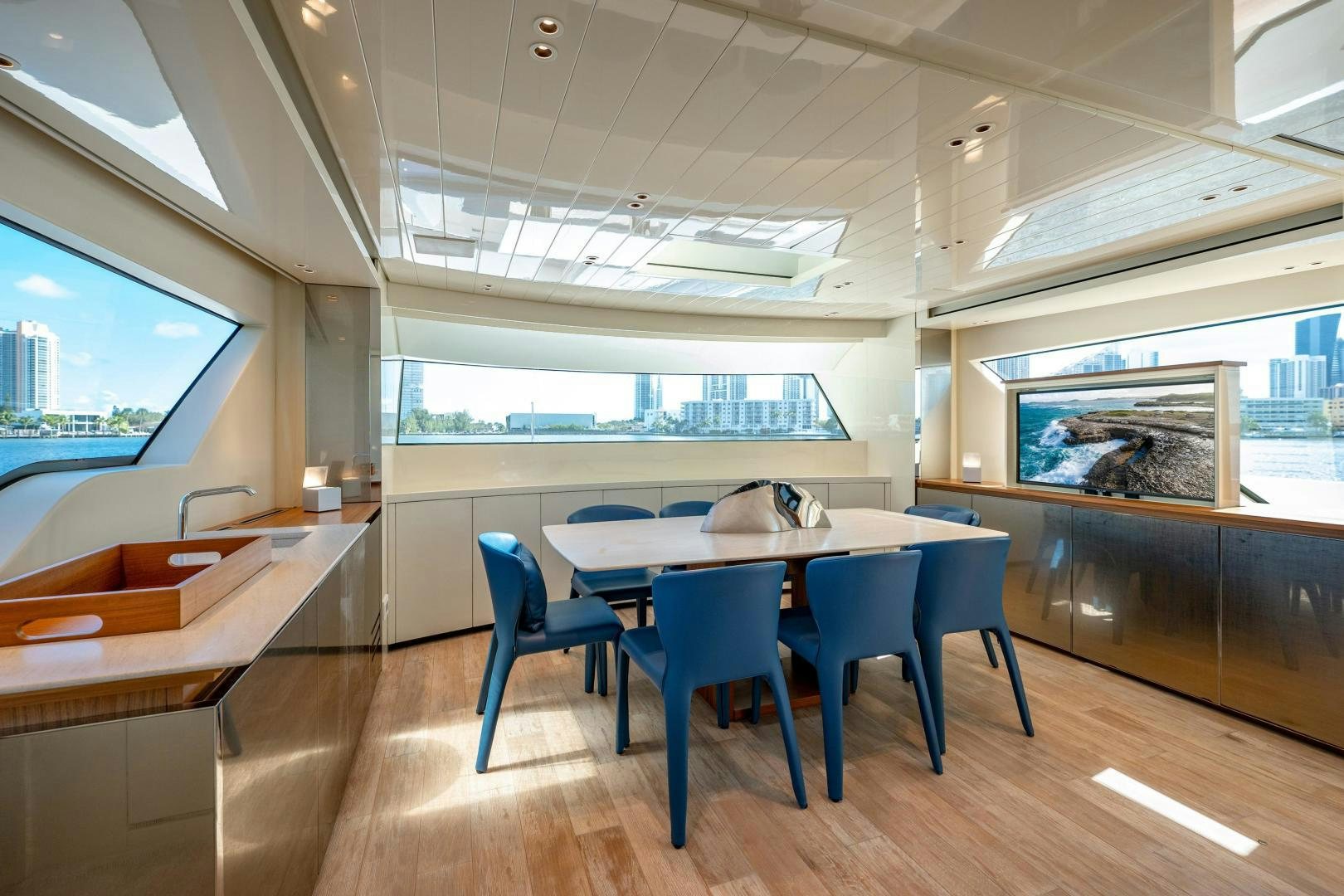 a room with a table and chairs aboard ABOUT TIME Yacht for Sale