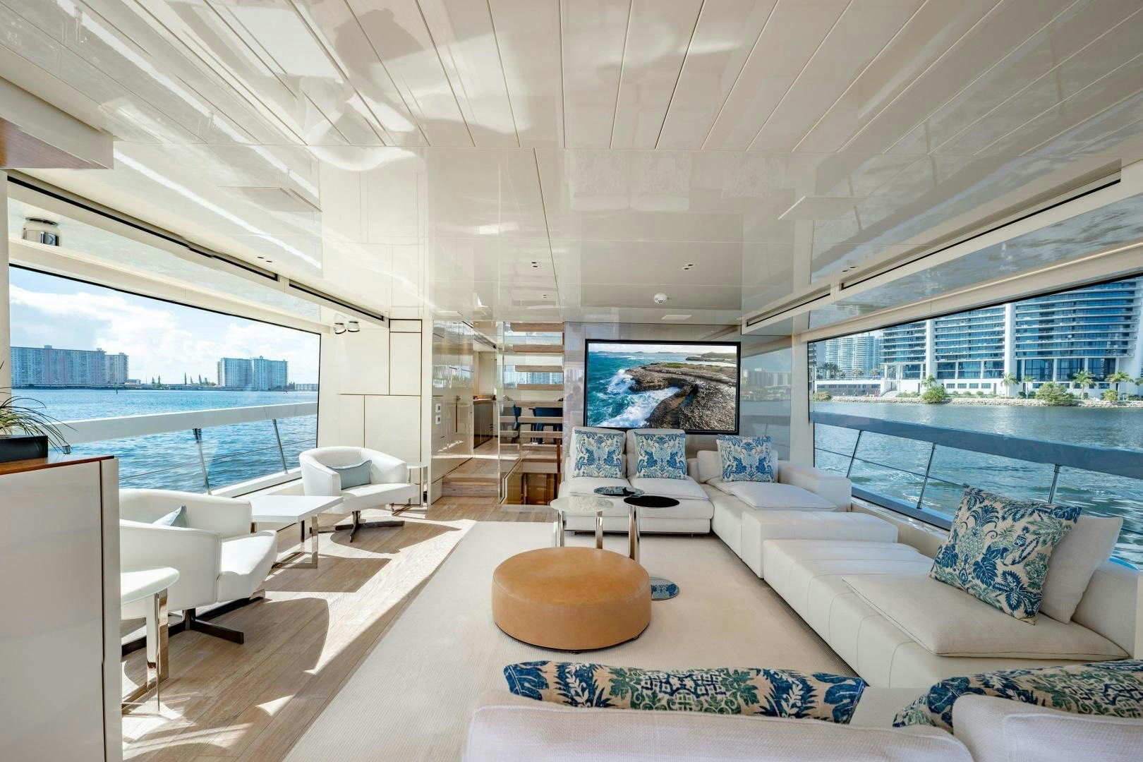 a living room with a large window aboard ABOUT TIME Yacht for Sale