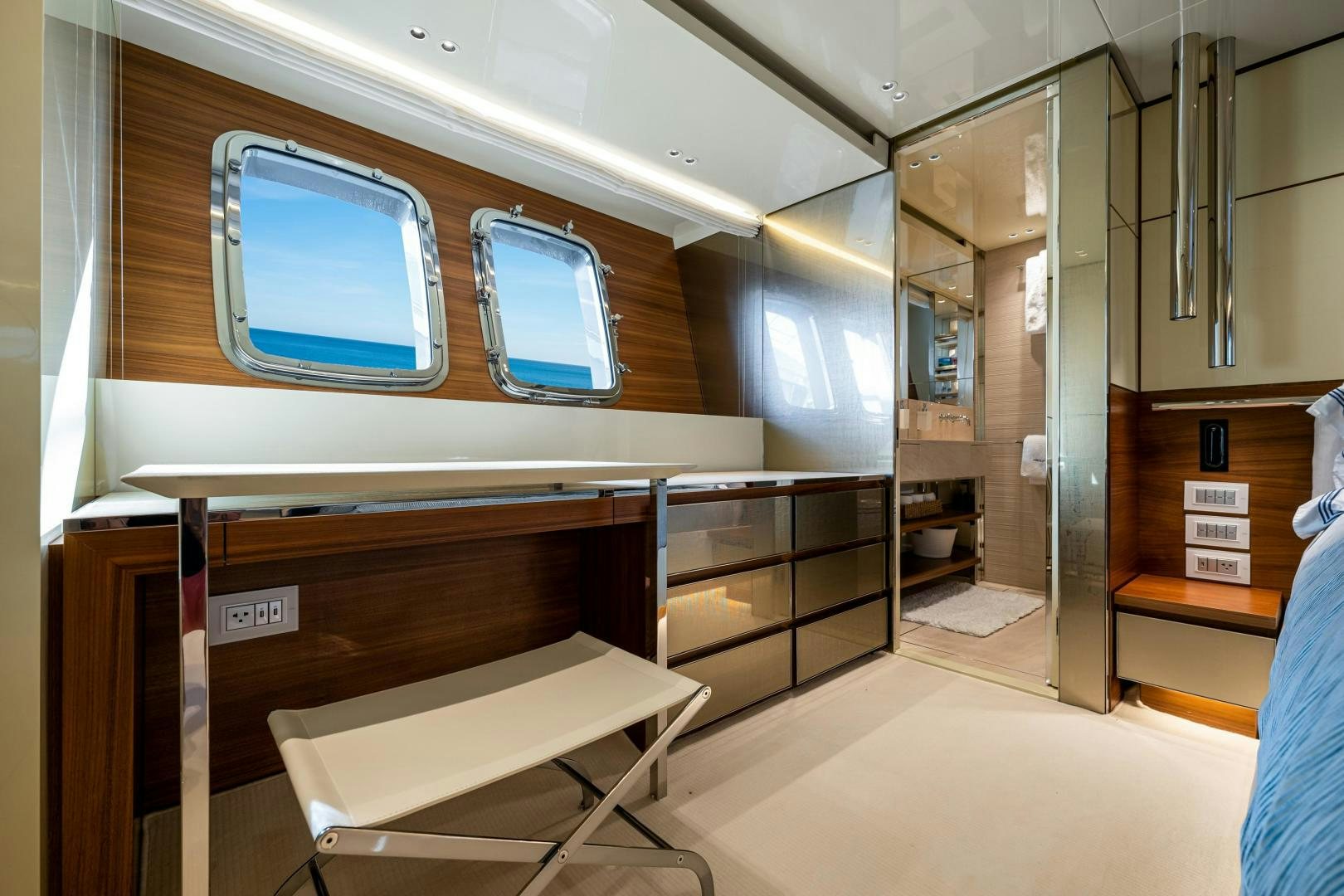 a room with a desk and a bed aboard ABOUT TIME Yacht for Sale