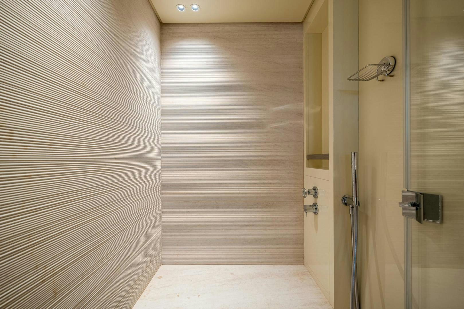 a room with a door and a shower aboard ABOUT TIME Yacht for Sale