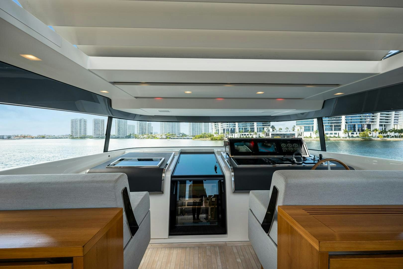 a boat with a deck and tables aboard ABOUT TIME Yacht for Sale