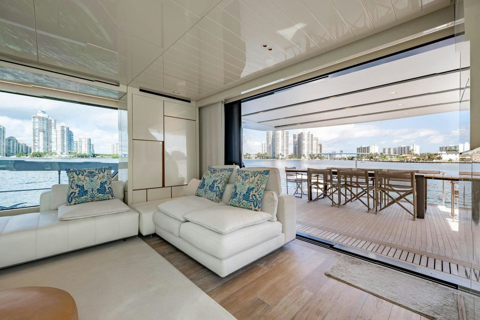 a living room with a large window aboard ABOUT TIME Yacht for Sale