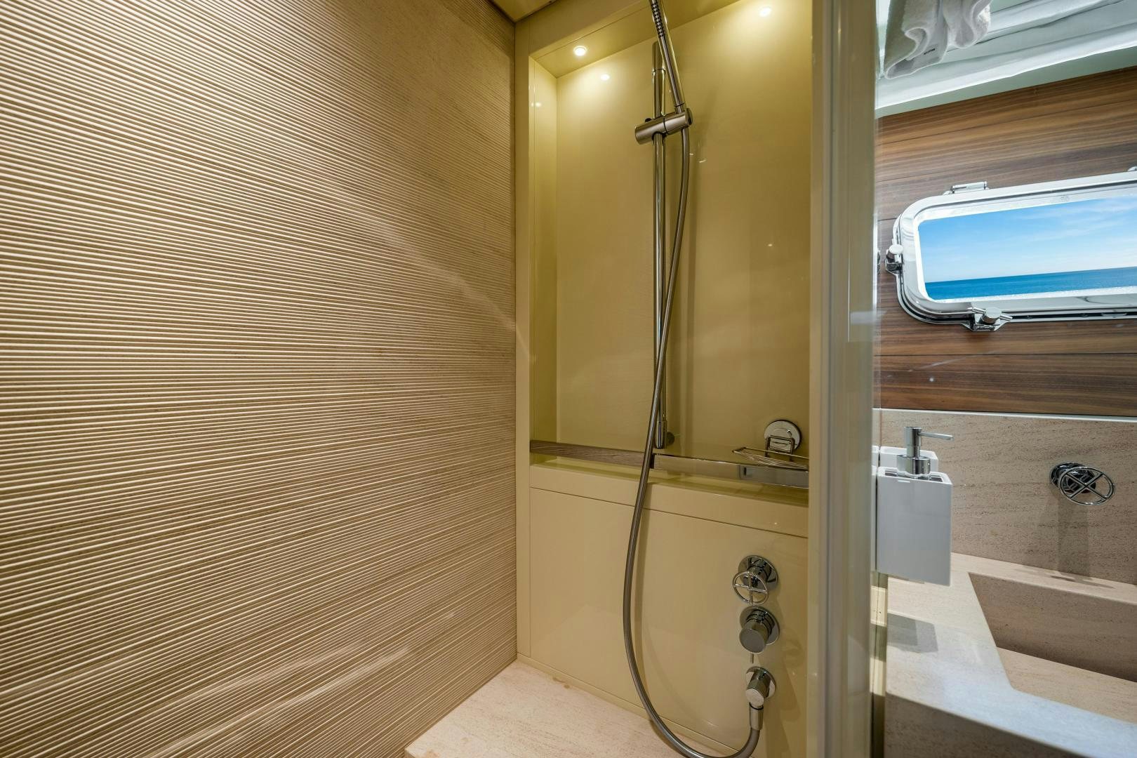 a shower unit in a bathroom aboard ABOUT TIME Yacht for Sale