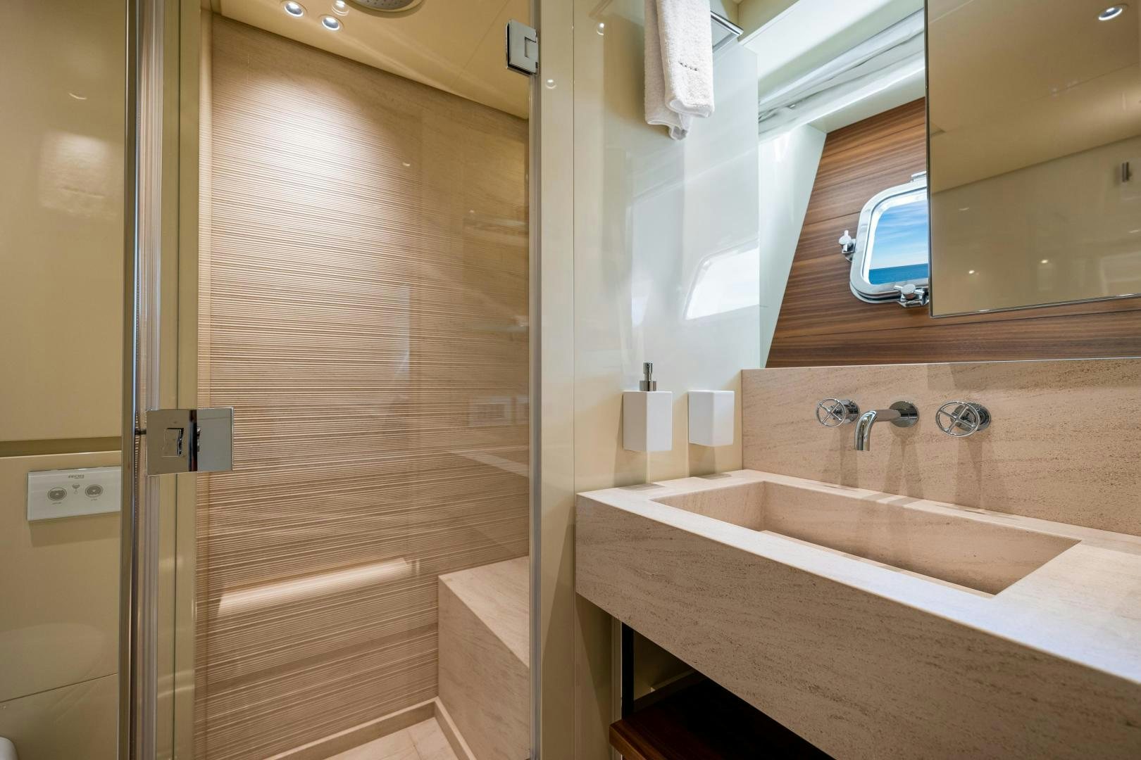 a bathroom with a bathtub and sink aboard ABOUT TIME Yacht for Sale
