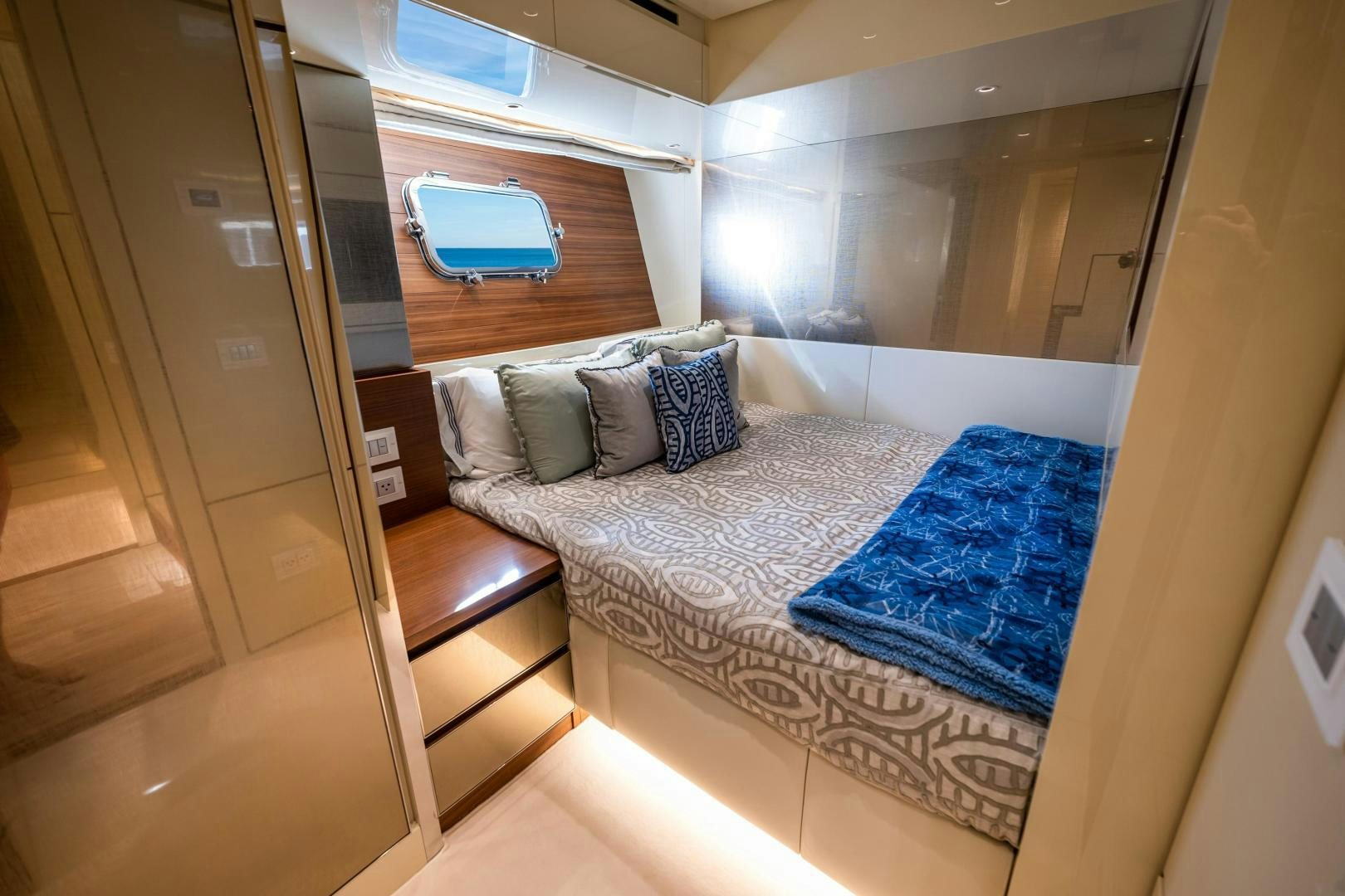 a bed in a room aboard ABOUT TIME Yacht for Sale