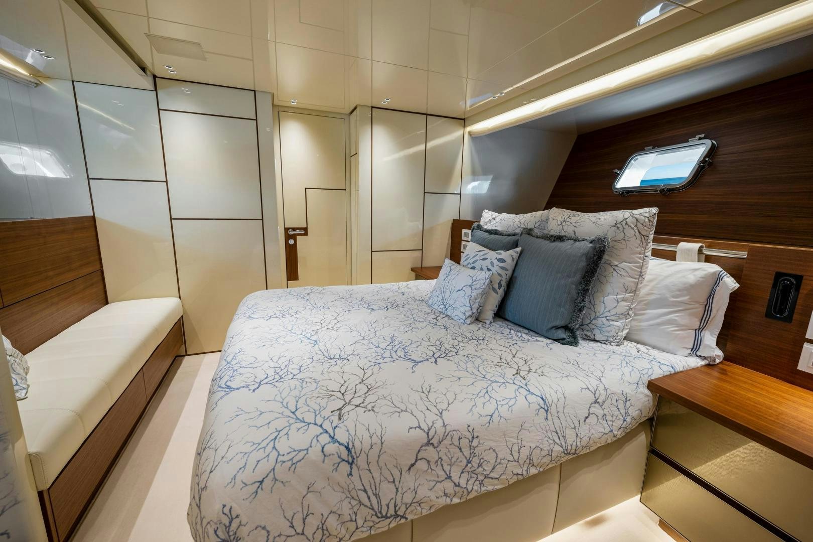a bed with white sheets aboard ABOUT TIME Yacht for Sale