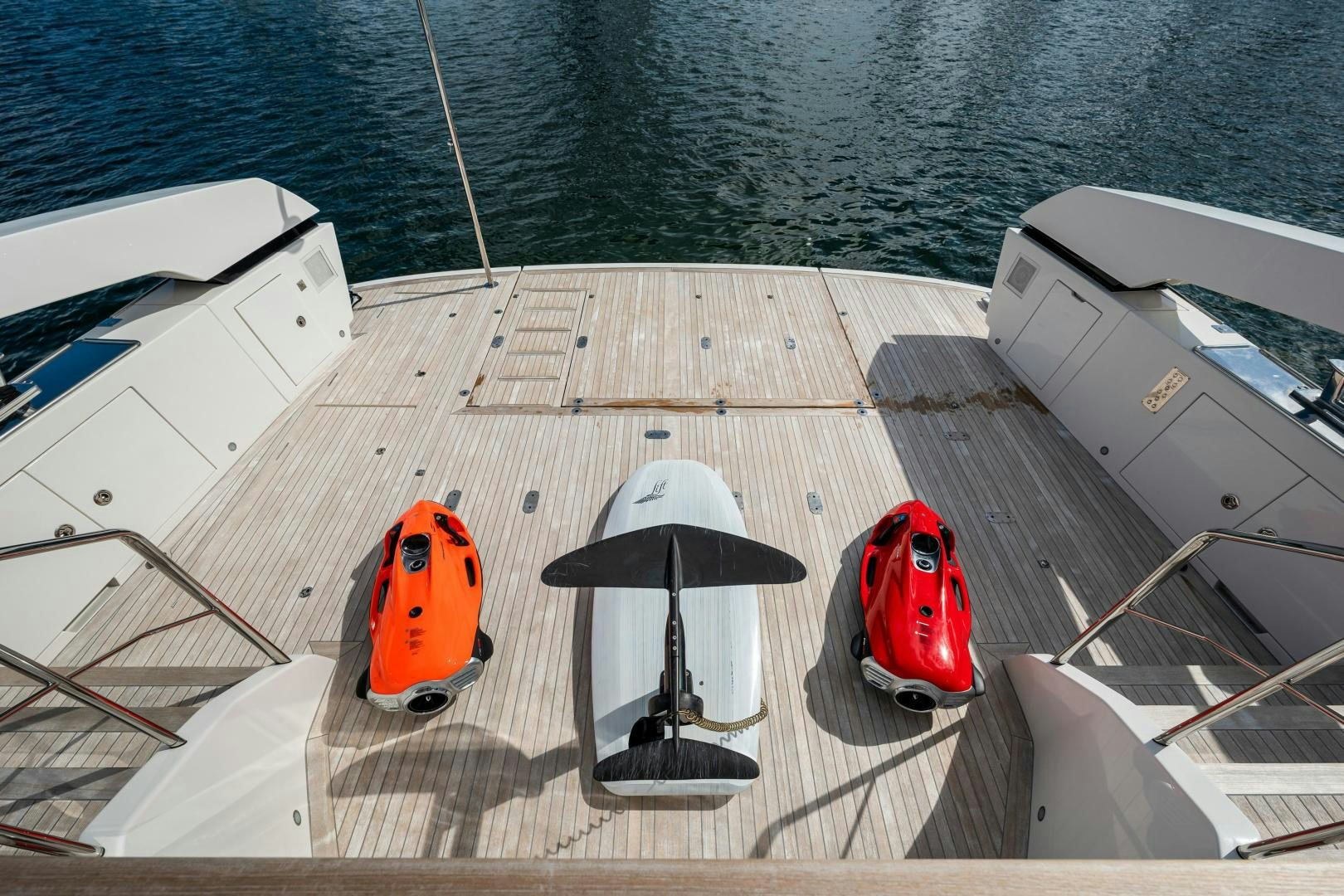 a boat with a couple of boats on it aboard ABOUT TIME Yacht for Sale