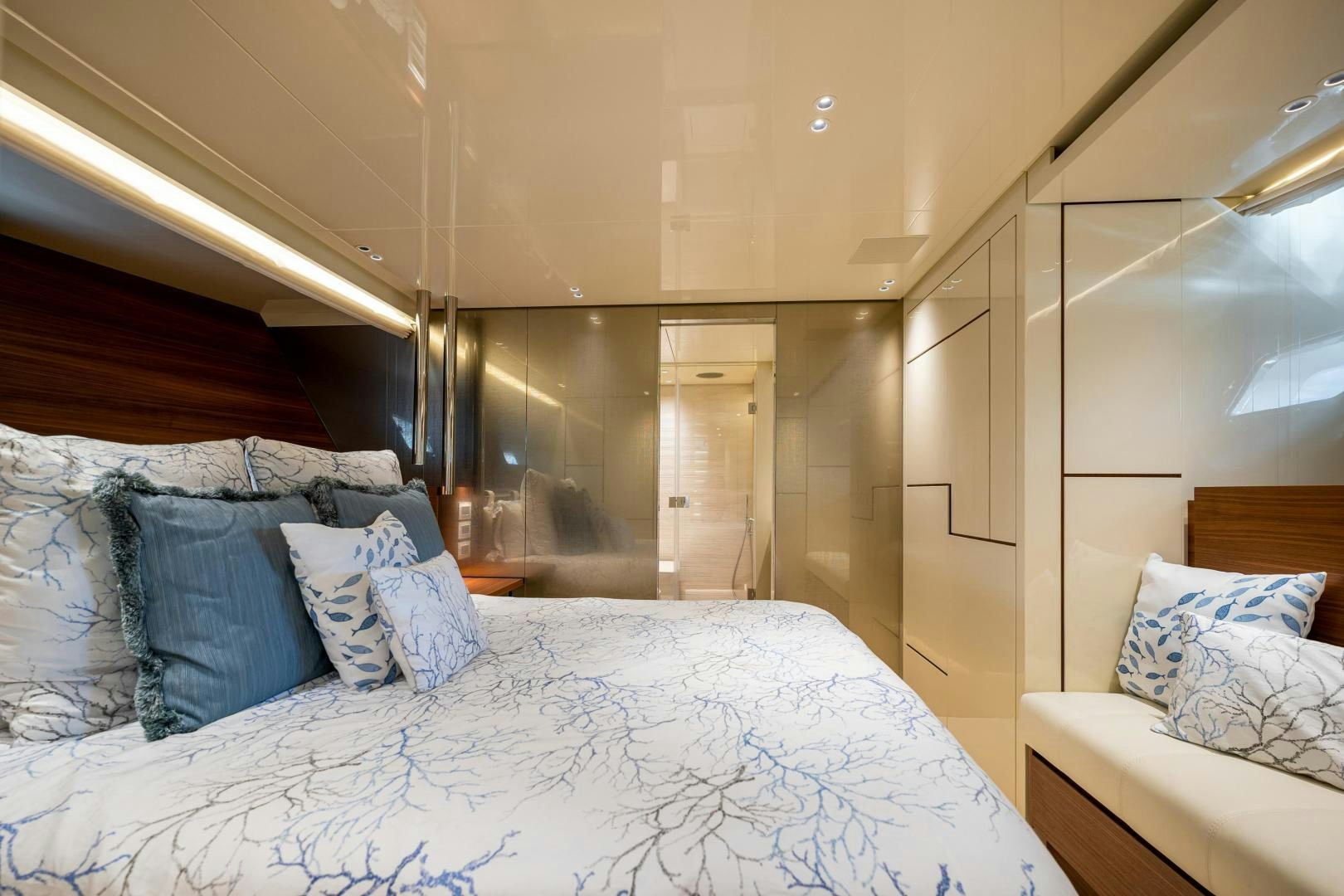 a bed with white sheets aboard ABOUT TIME Yacht for Sale