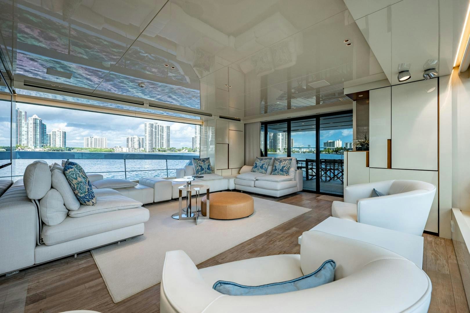 a living room with a large window aboard ABOUT TIME Yacht for Sale