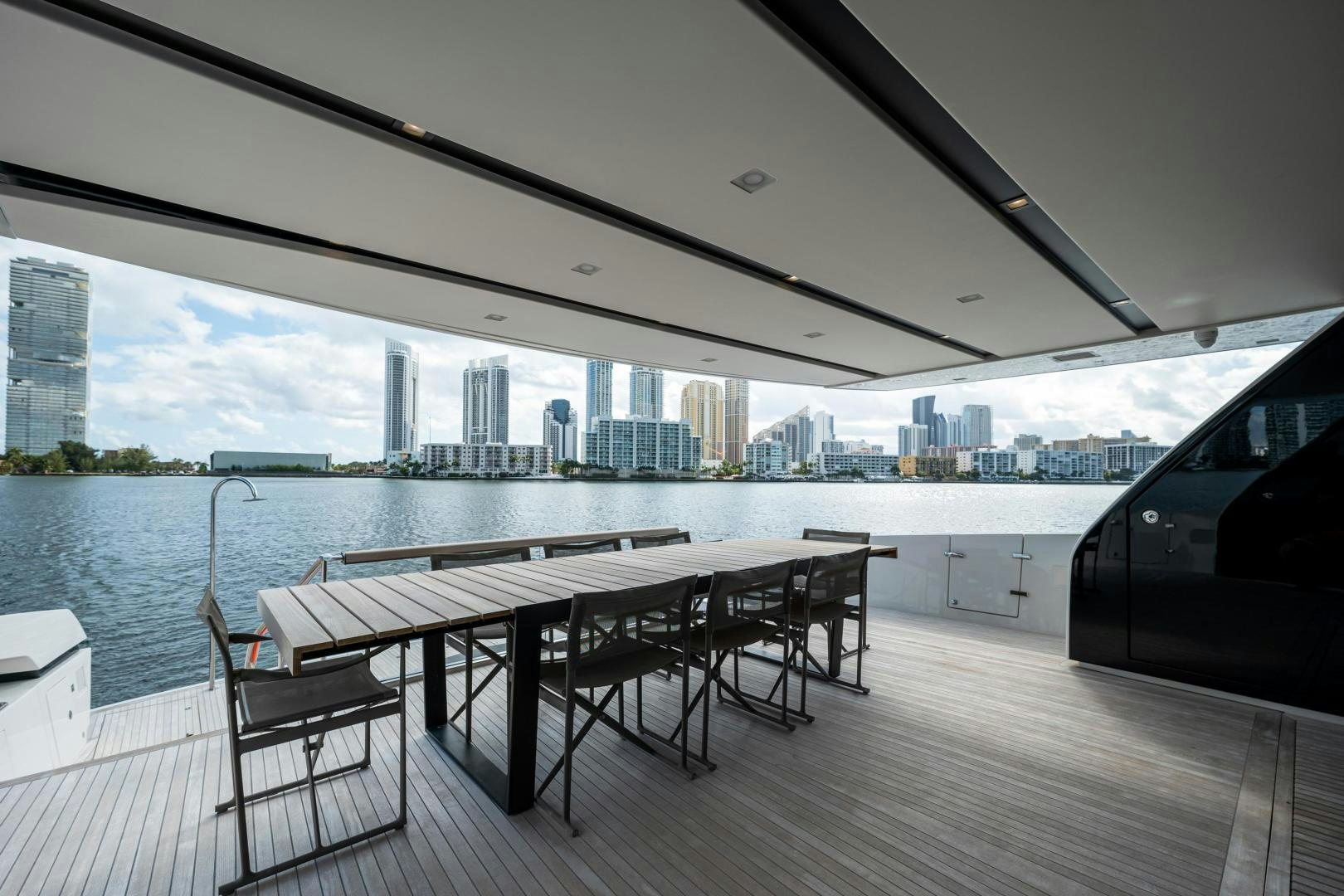 a table and chairs on a deck aboard ABOUT TIME Yacht for Sale