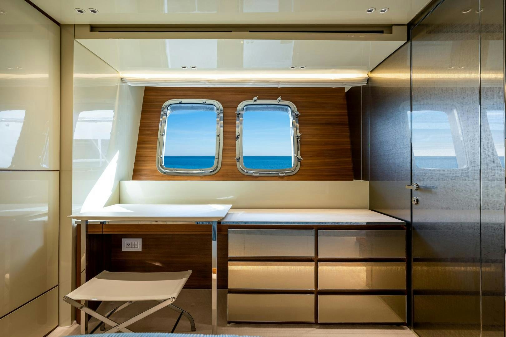 a train with a bench aboard ABOUT TIME Yacht for Sale