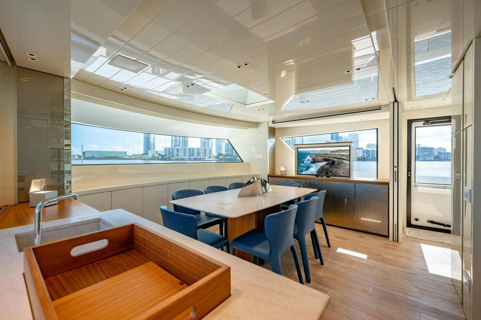 a room with a table and chairs aboard ABOUT TIME Yacht for Sale