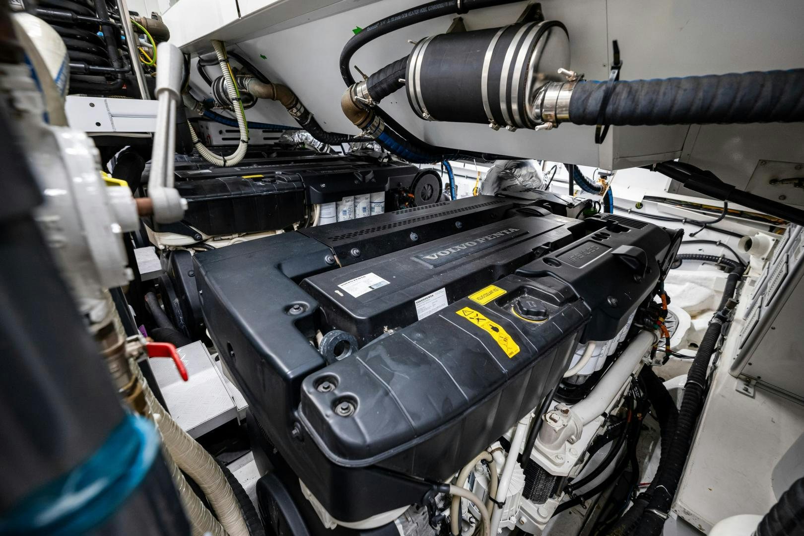 a car engine with a black hood aboard ABOUT TIME Yacht for Sale