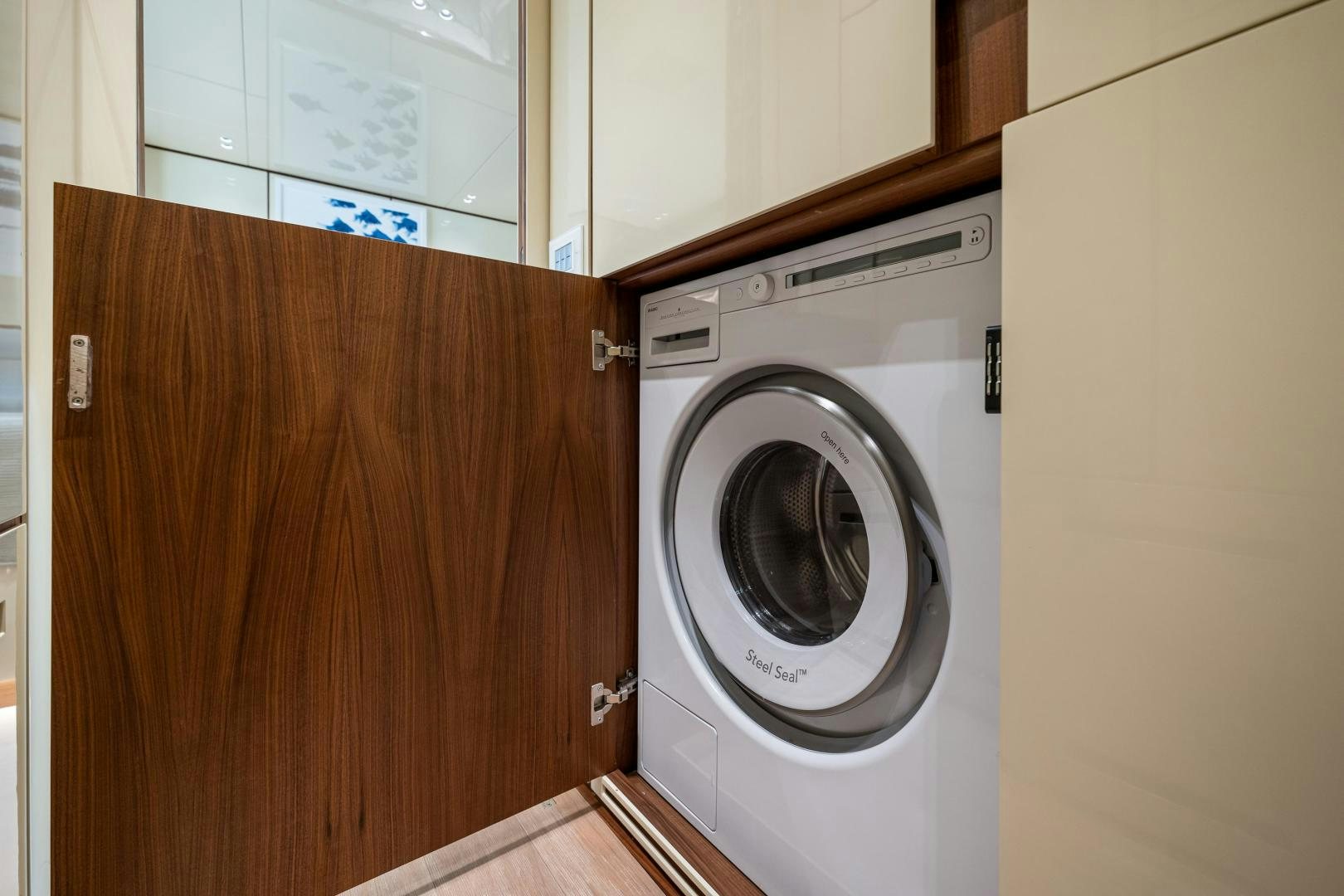 a white washing machine aboard ABOUT TIME Yacht for Sale