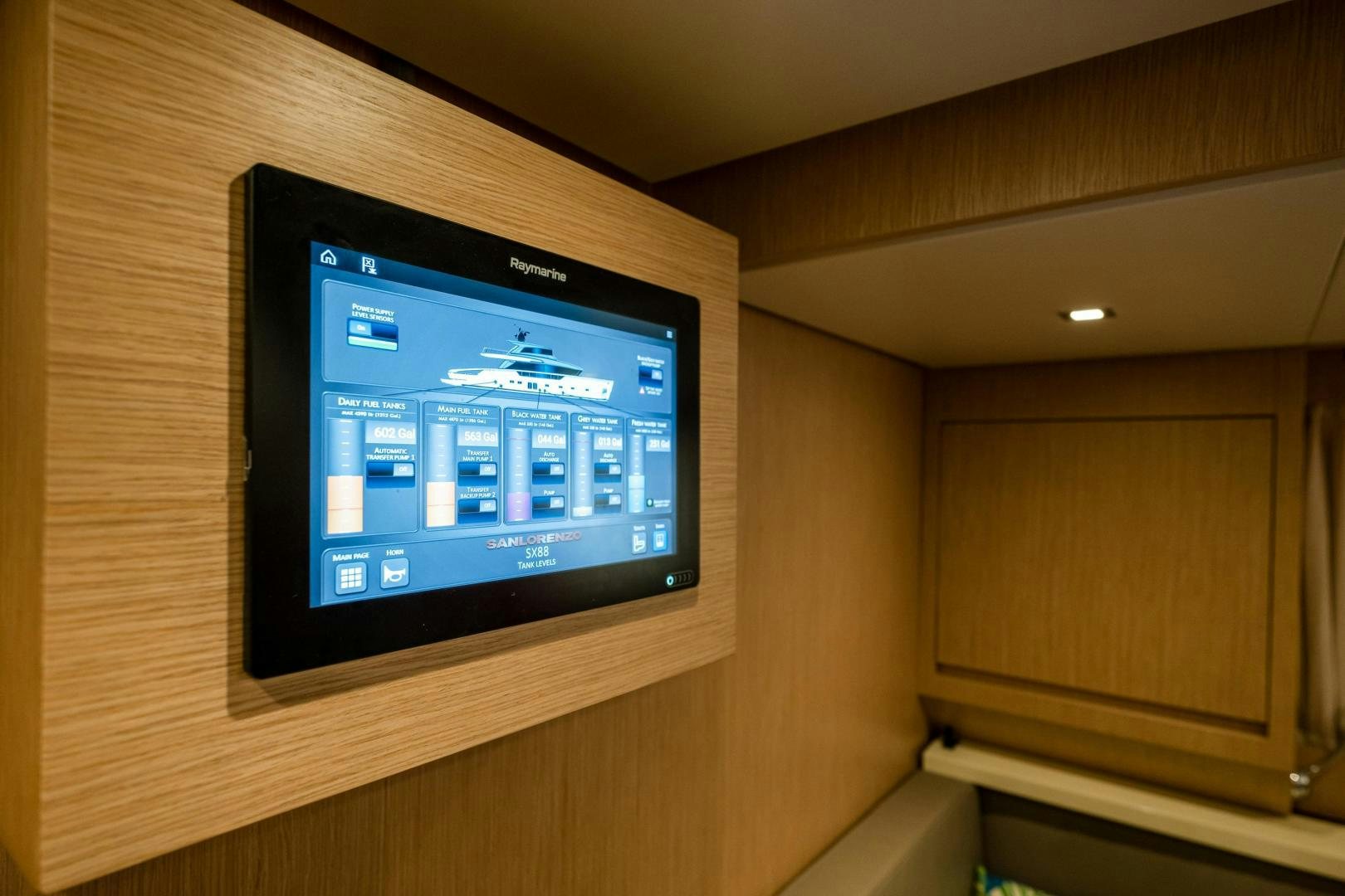 a tv on a wall aboard ABOUT TIME Yacht for Sale