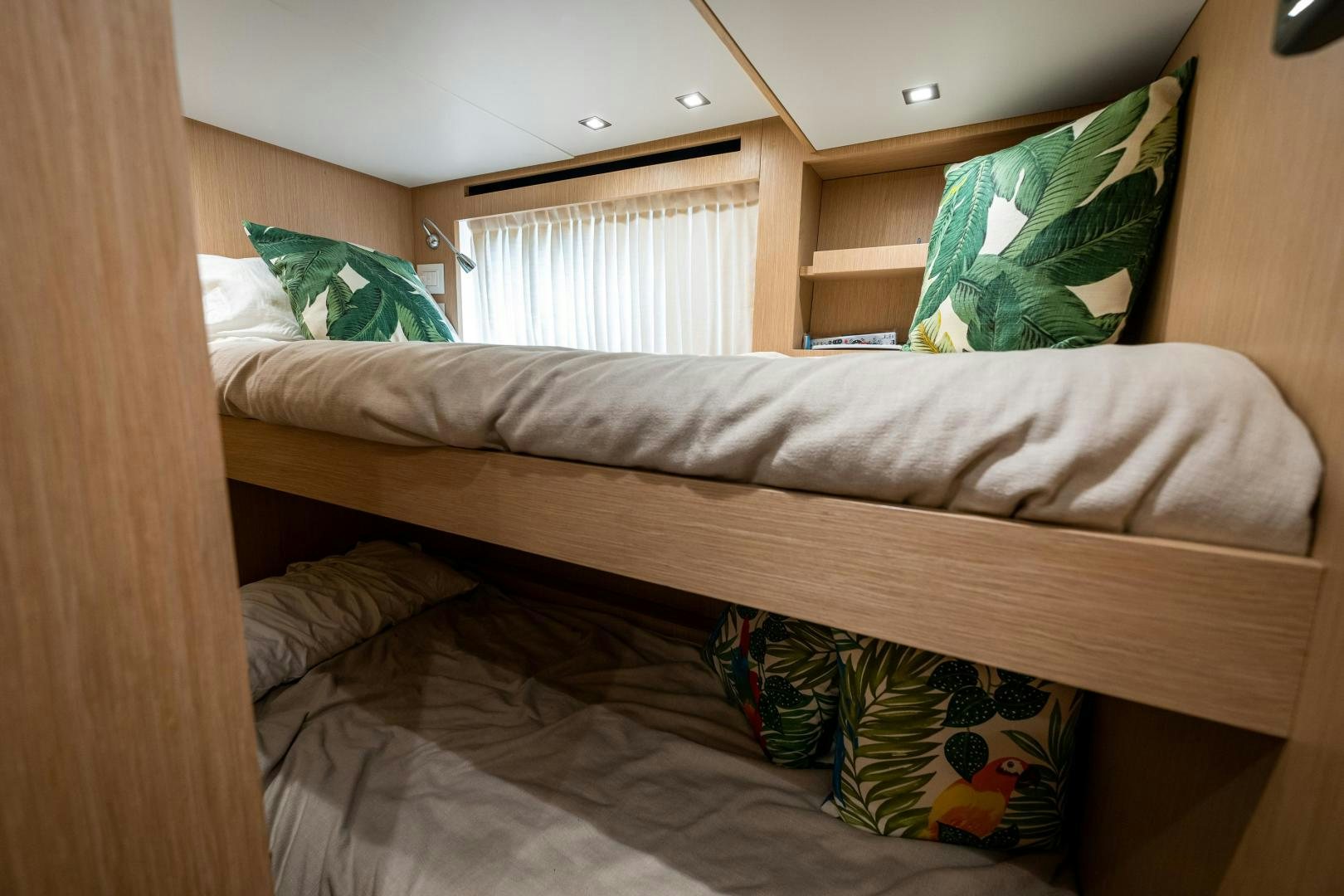 a bed with a pillow and a pillow on it aboard ABOUT TIME Yacht for Sale