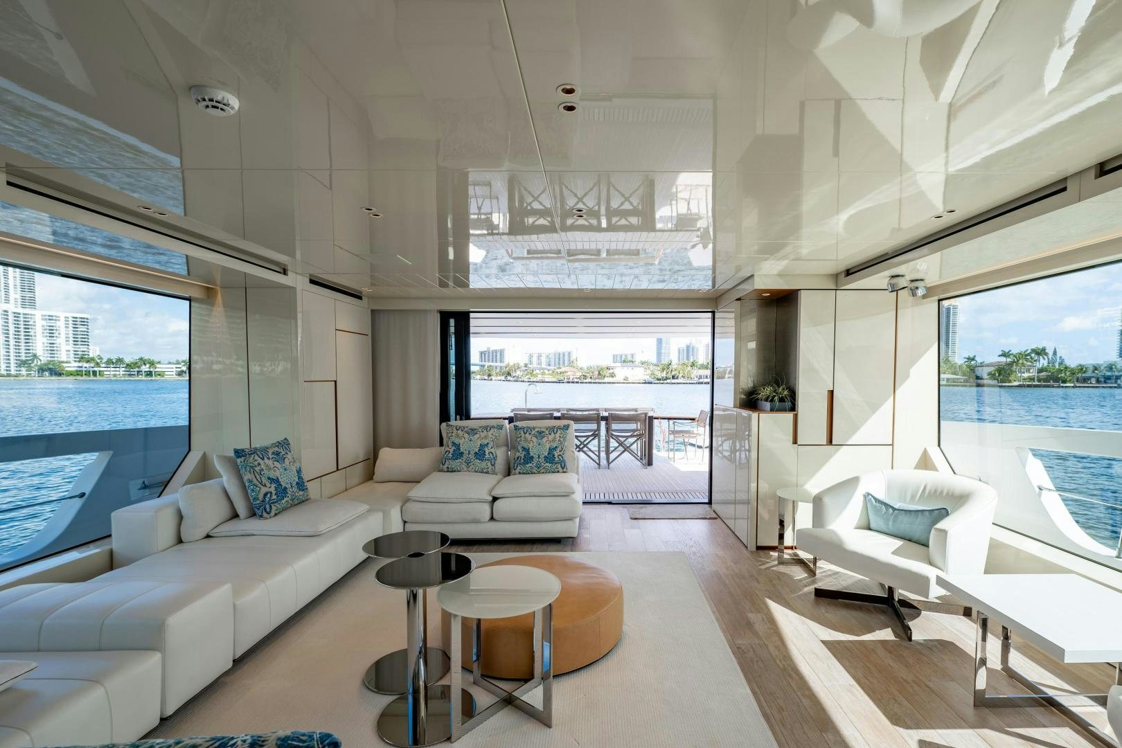 a living room with a large window aboard ABOUT TIME Yacht for Sale