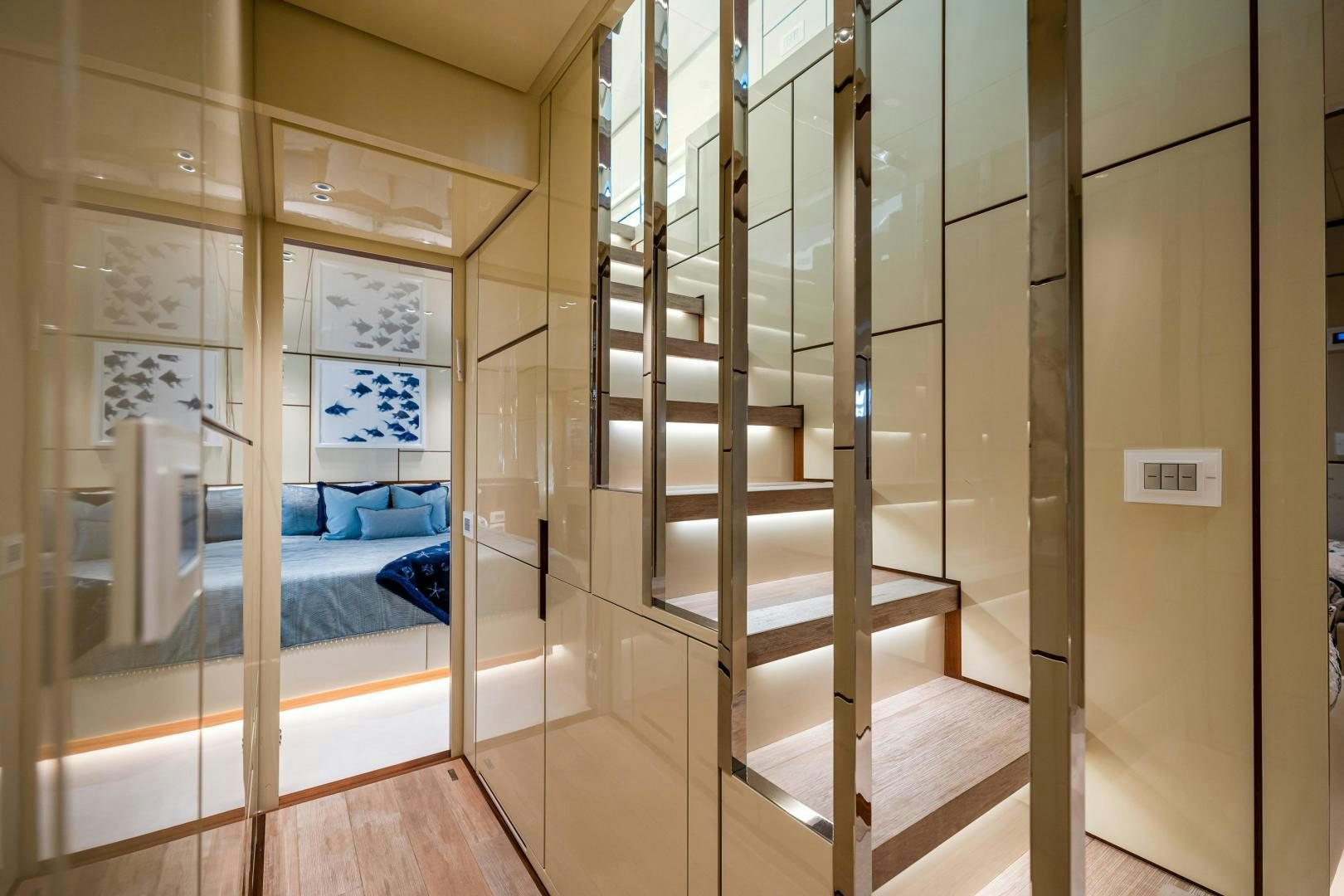 a room with a bed and a glass door aboard ABOUT TIME Yacht for Sale