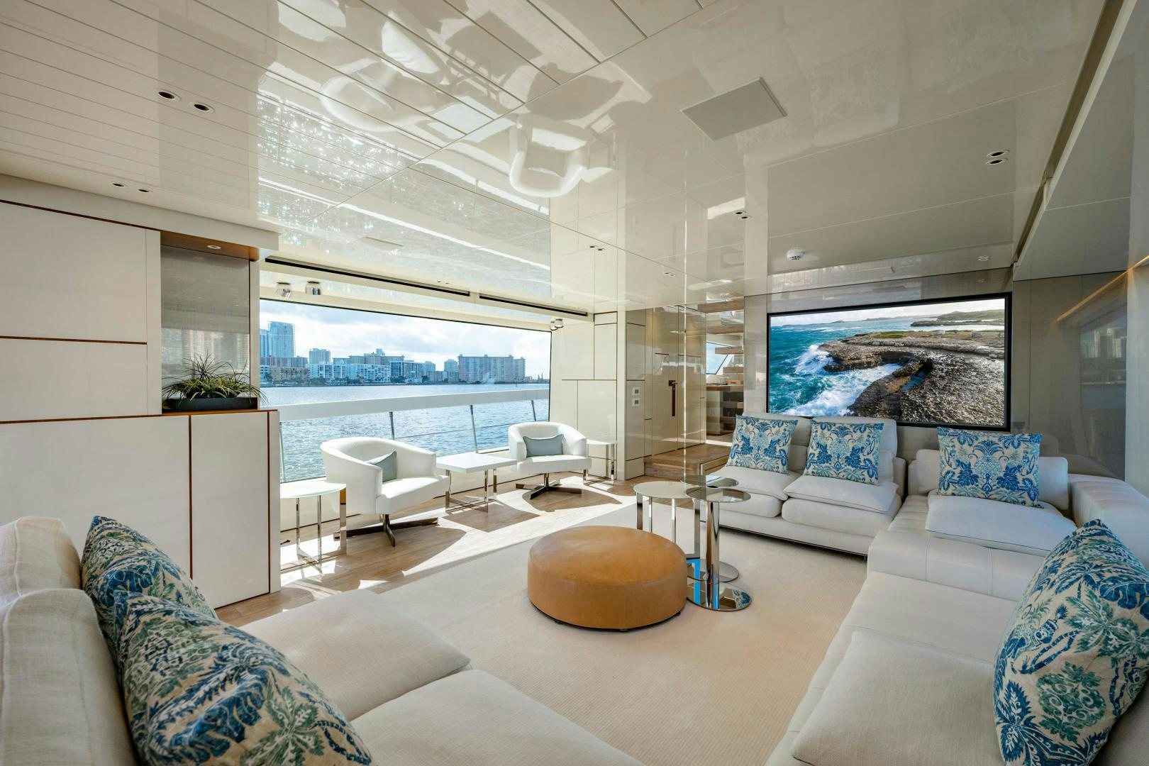 a living room with a large window aboard ABOUT TIME Yacht for Sale
