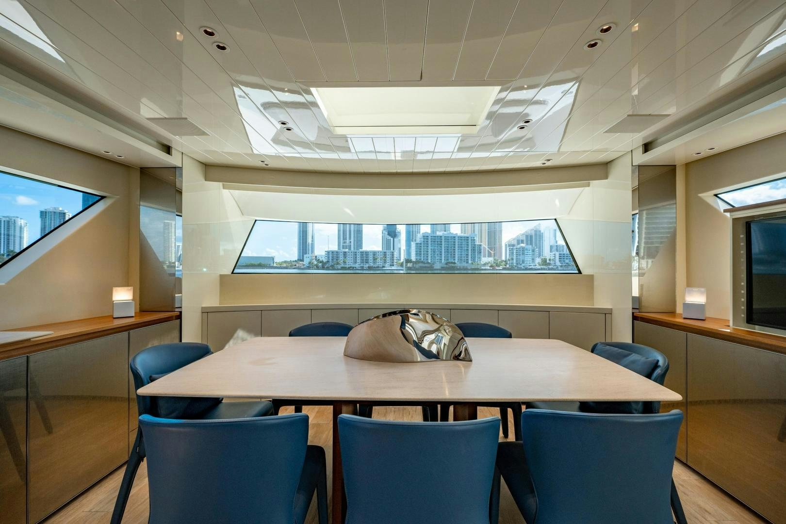 a room with a table and chairs aboard ABOUT TIME Yacht for Sale