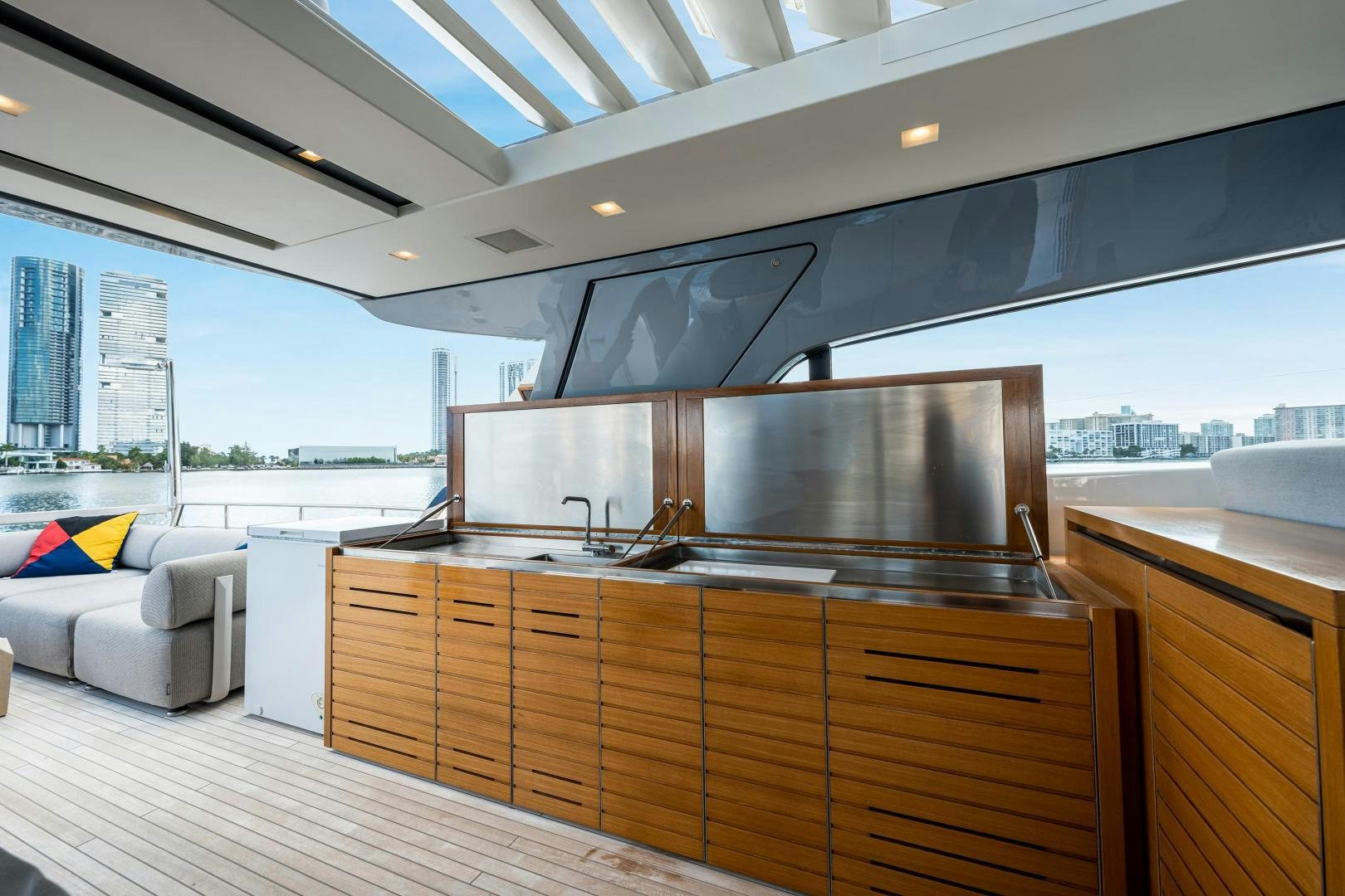 a kitchen with a large island aboard ABOUT TIME Yacht for Sale