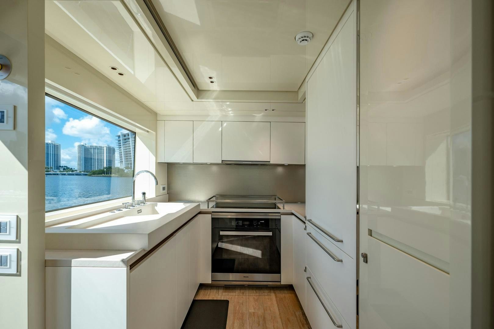 a kitchen with a window aboard ABOUT TIME Yacht for Sale