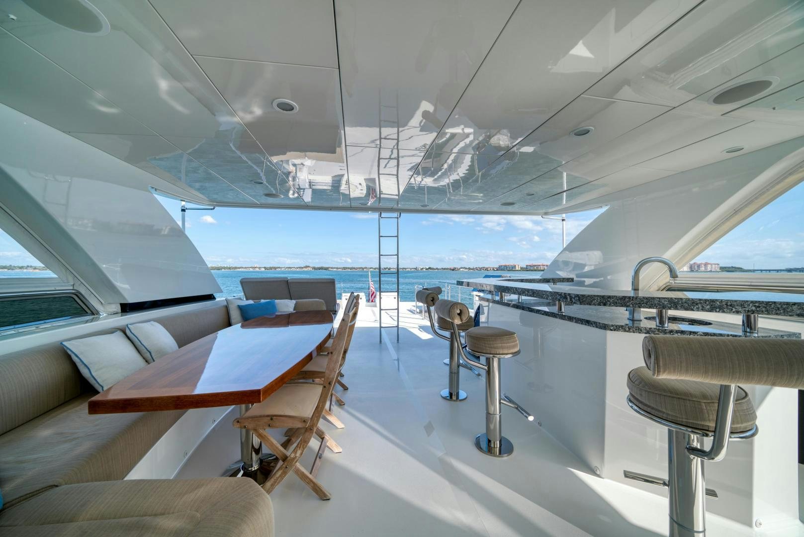 a boat with tables and chairs aboard SANCTUARY Yacht for Sale