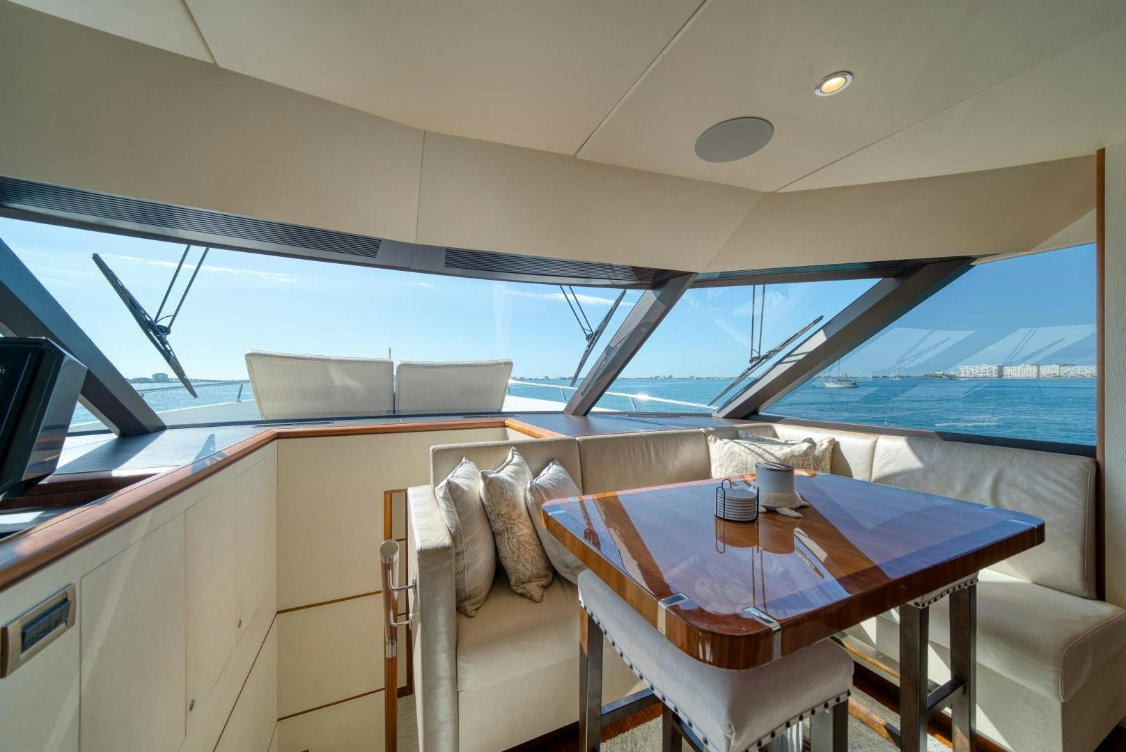 a boat with a table and chairs aboard SANCTUARY Yacht for Sale