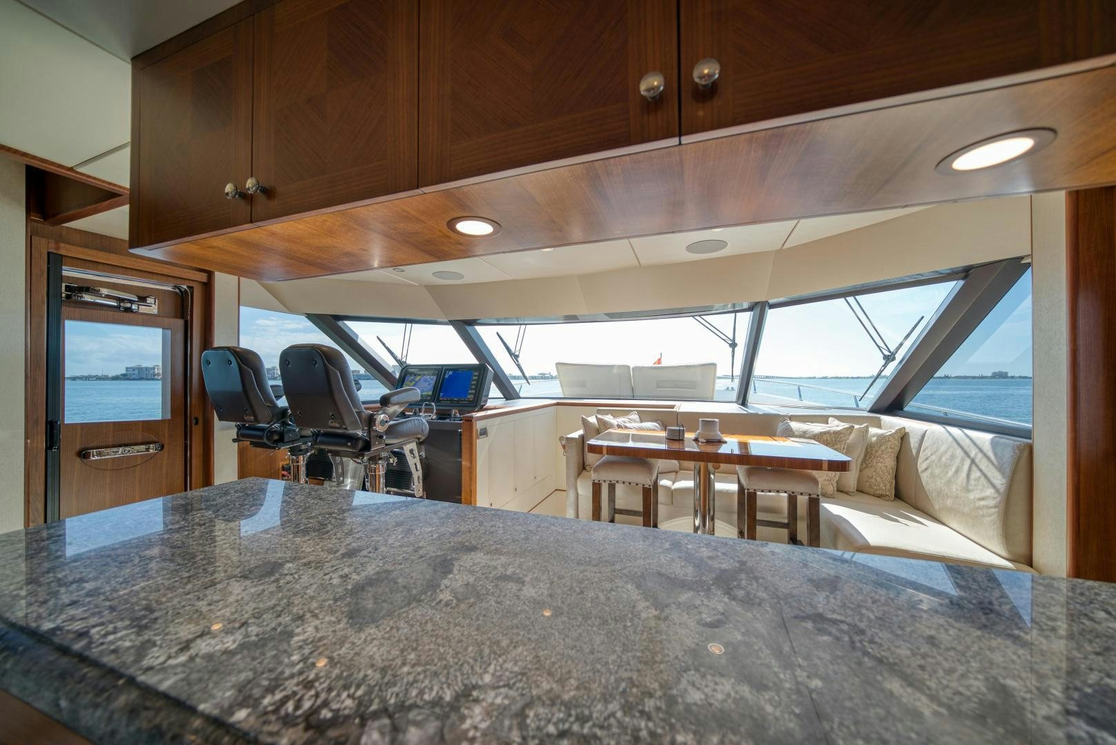 a large kitchen with a large table aboard SANCTUARY Yacht for Sale