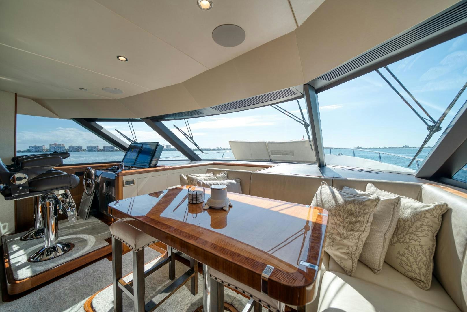 a boat with a table and chairs aboard SANCTUARY Yacht for Sale