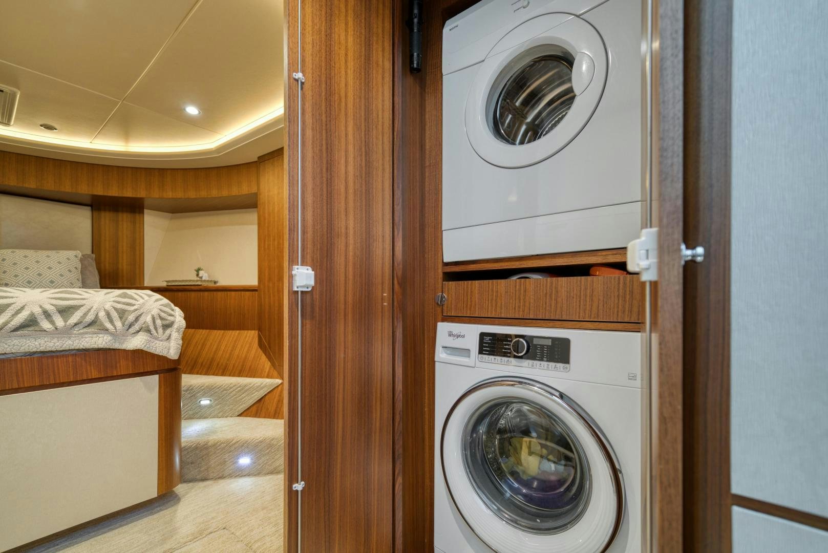 a washer and dryer in a room aboard SANCTUARY Yacht for Sale