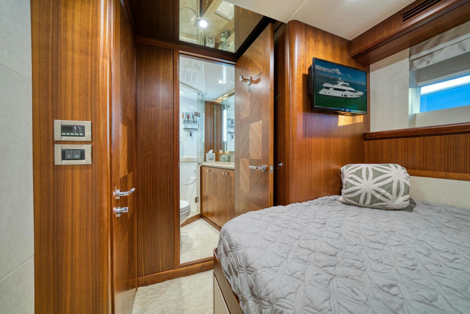 a bed in a room aboard SANCTUARY Yacht for Sale