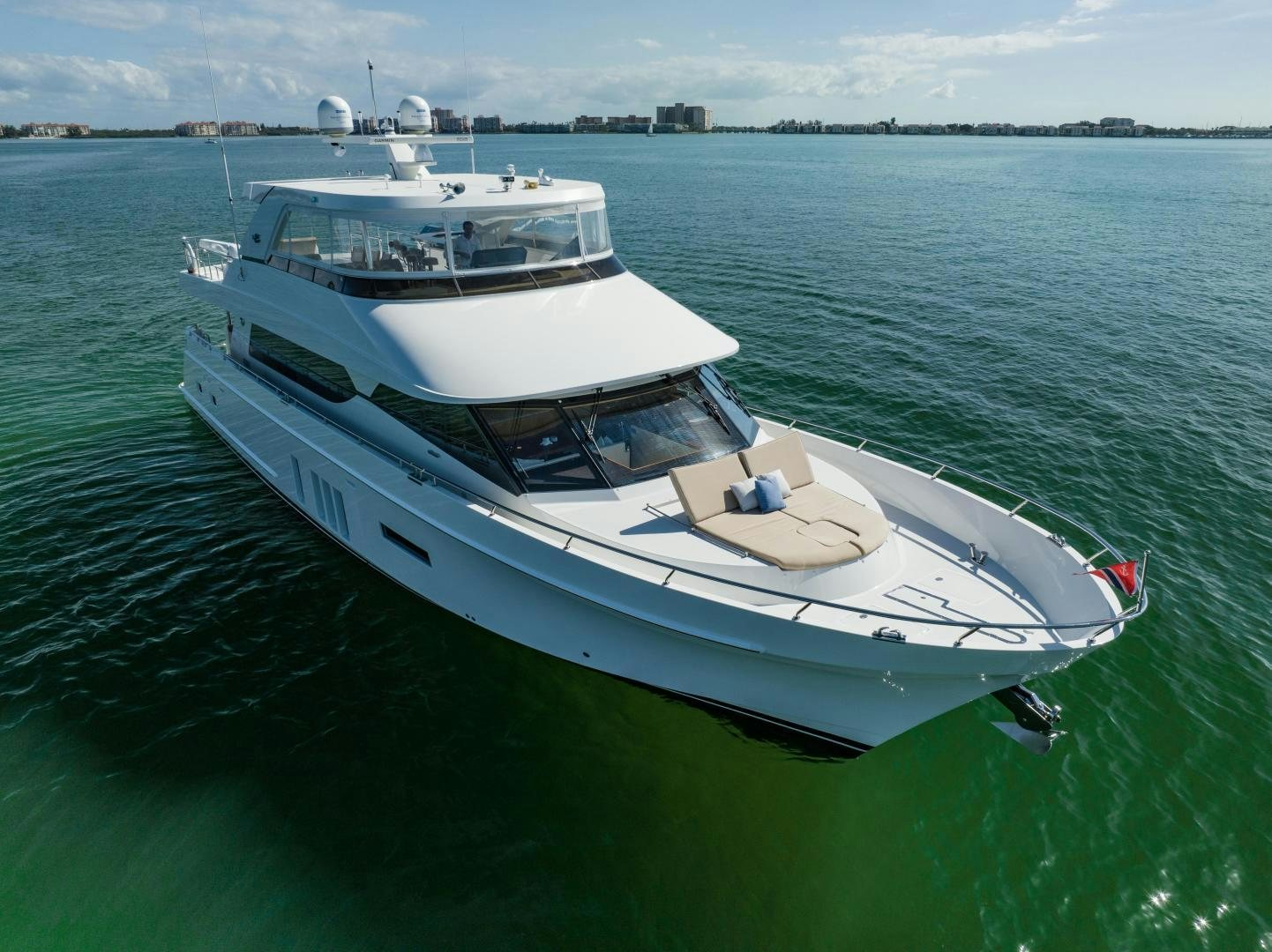a white boat in the water aboard SANCTUARY Yacht for Sale
