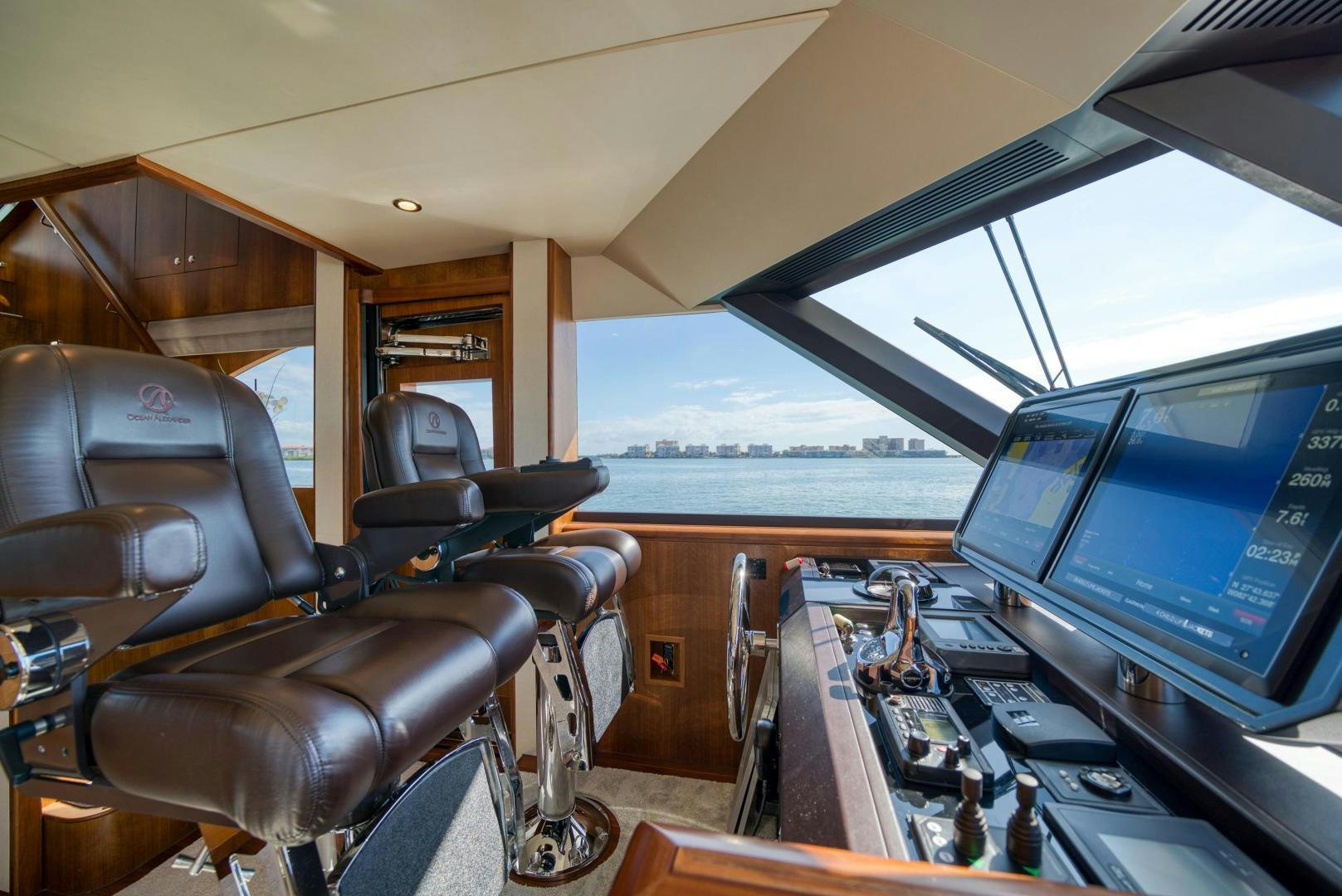 inside of a vehicle with a view of the water and the land below aboard SANCTUARY Yacht for Sale