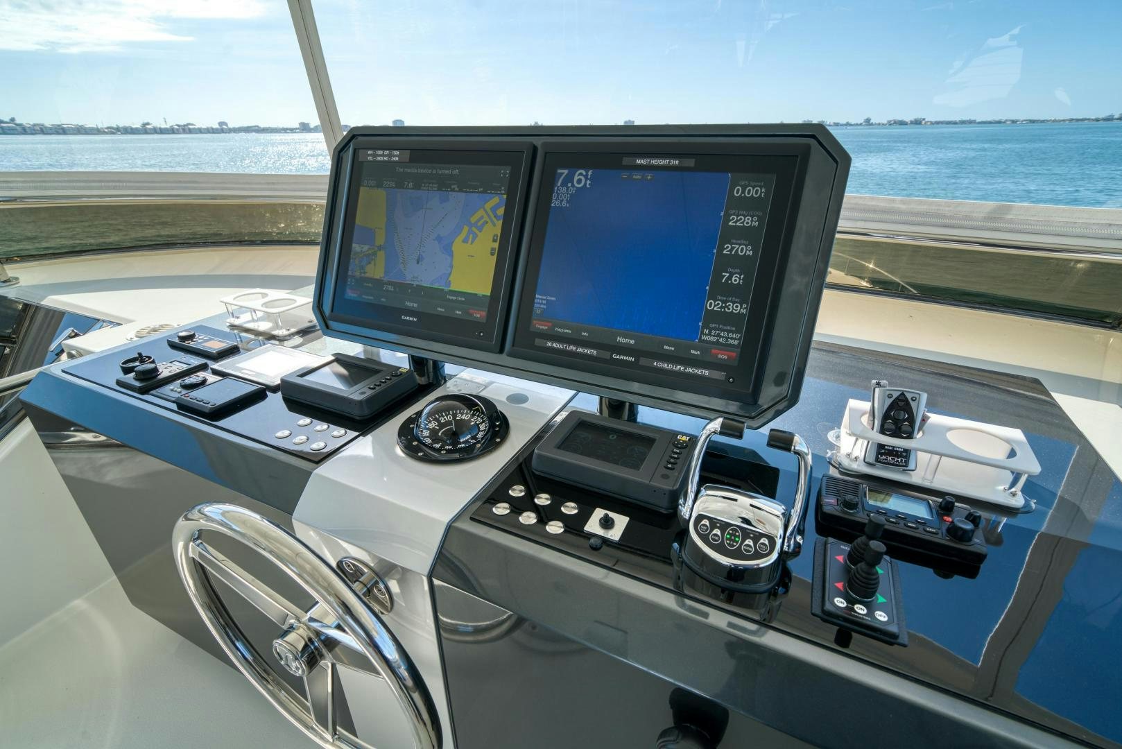 a control panel with a monitor and a keyboard aboard SANCTUARY Yacht for Sale