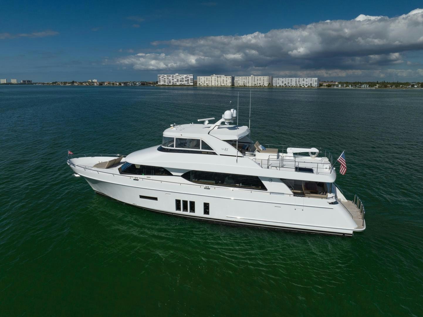a white boat in the water aboard SANCTUARY Yacht for Sale