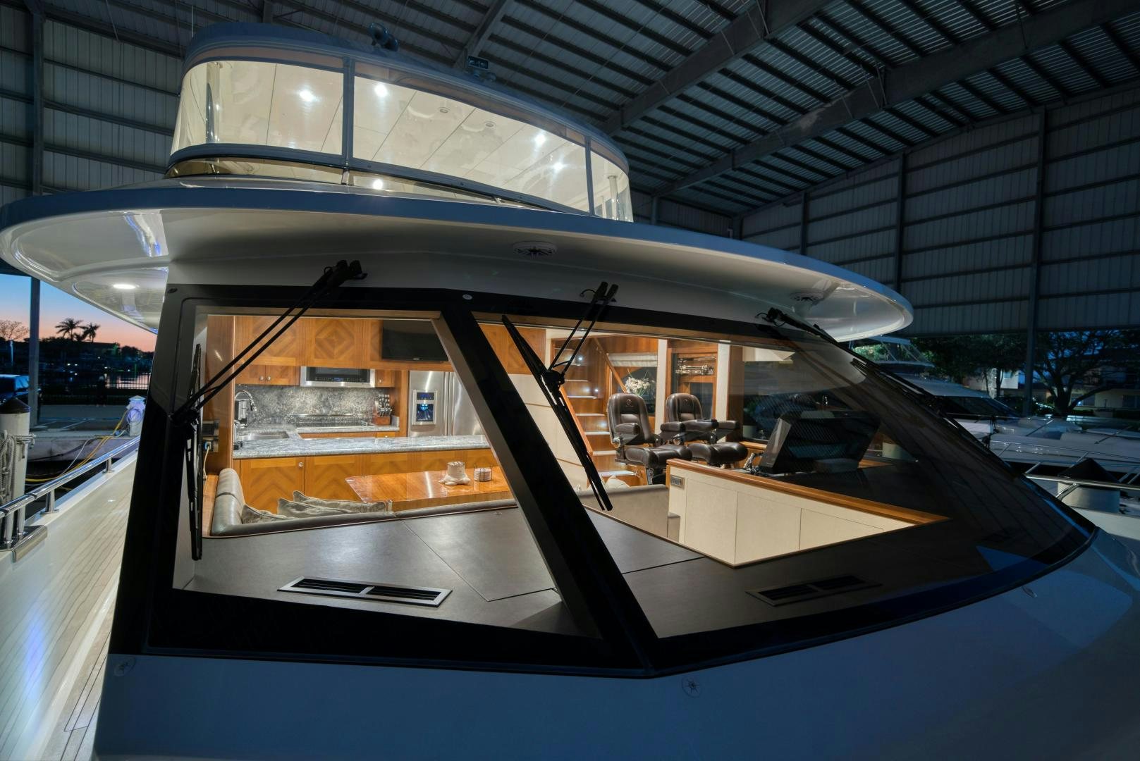 inside of a building with a glass ceiling and a large window aboard SANCTUARY Yacht for Sale