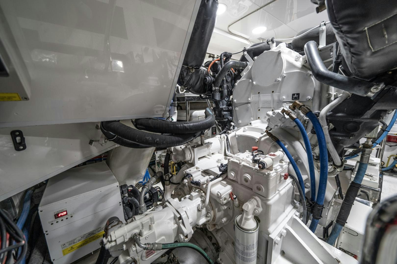 a car engine with a blue cable aboard SANCTUARY Yacht for Sale