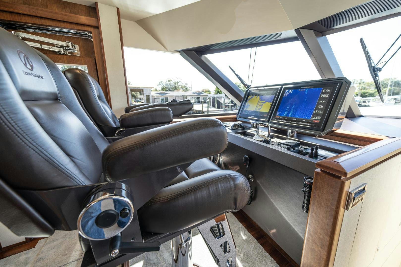 a car with a laptop and a monitor on it aboard SANCTUARY Yacht for Sale